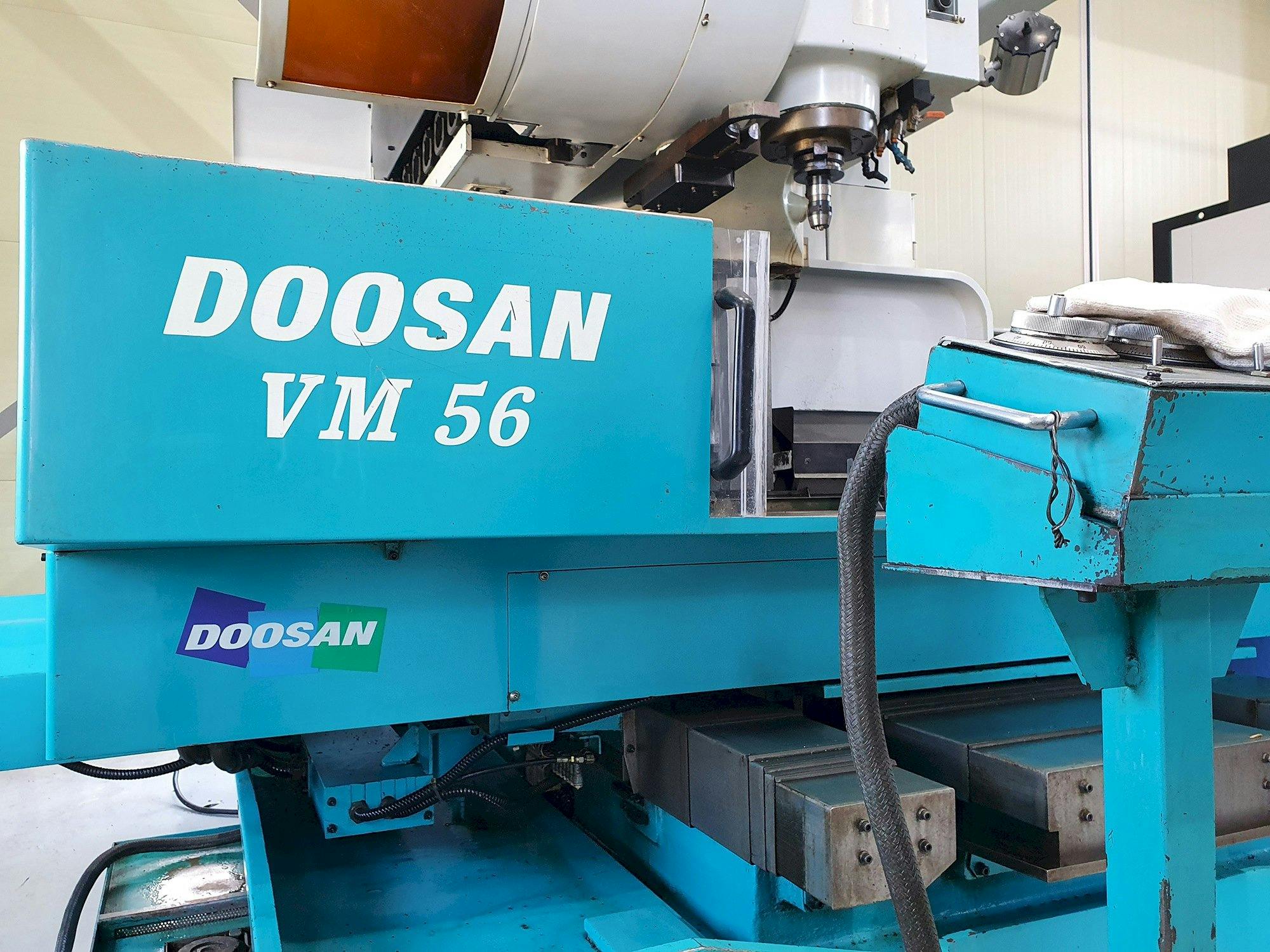 Mašīnas Doosan VM56  pretskats