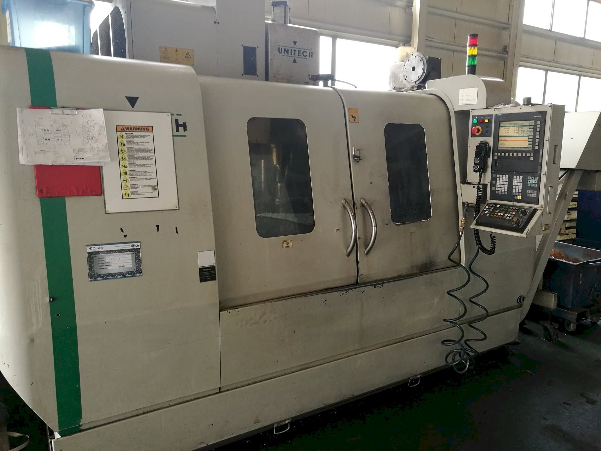 Mašīnas UNITECH VMC-1250P3 pretskats