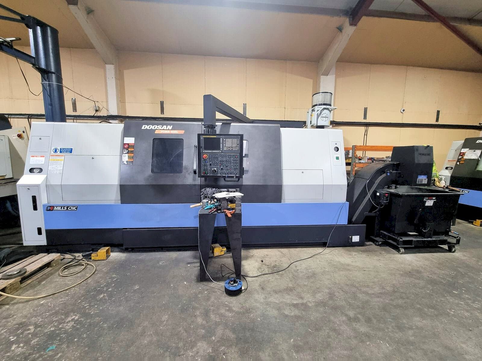 Mašīnas DOOSAN Puma 400LB  pretskats