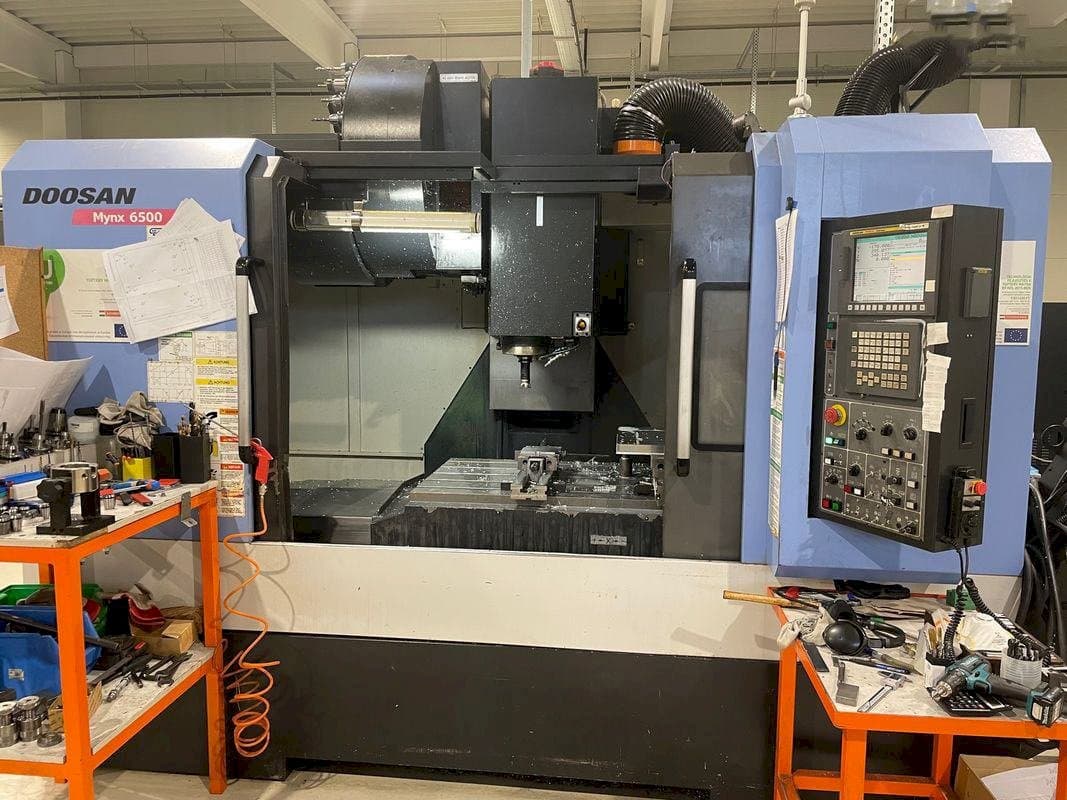 Mašīnas Doosan MYNX DNM 6500  pretskats