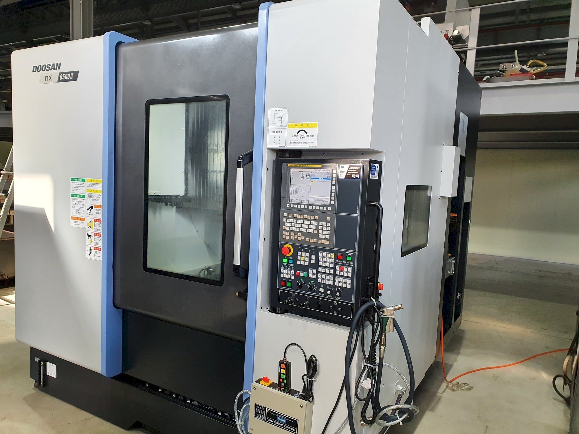 Mašīnas Doosan NX6500Ⅱ  pretskats