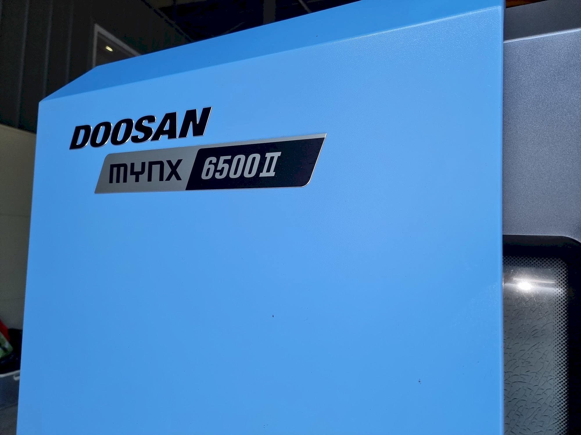 Mašīnas Doosan MYNX 6500Ⅱ pretskats