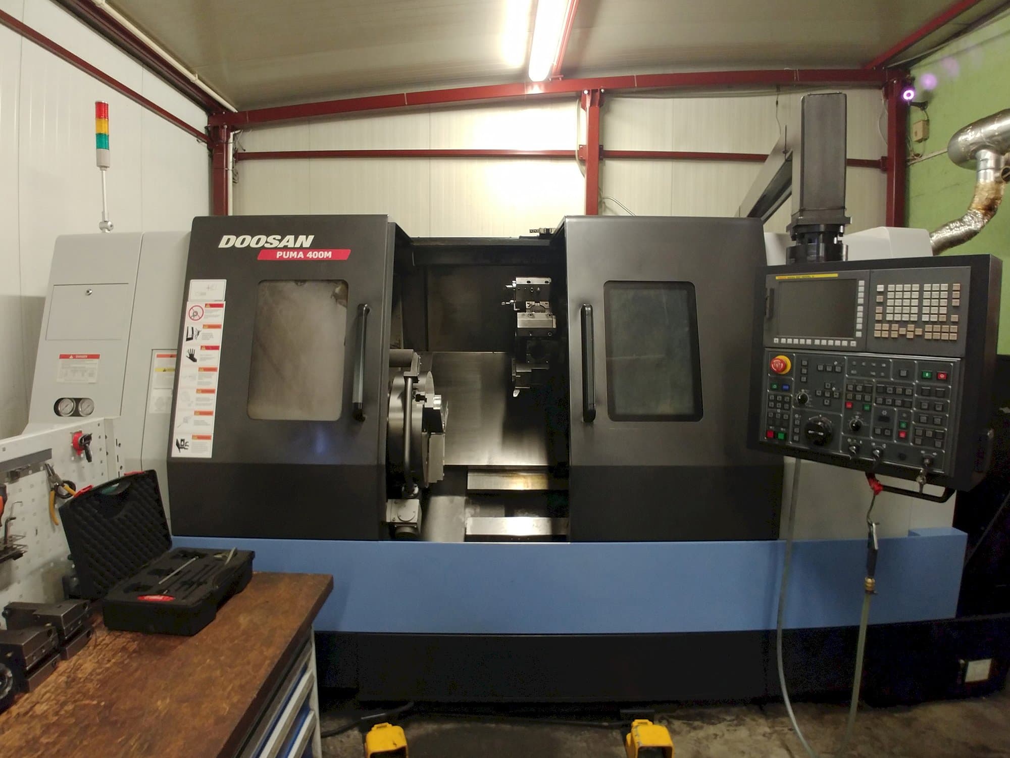Mašīnas Doosan Puma 400MC pretskats