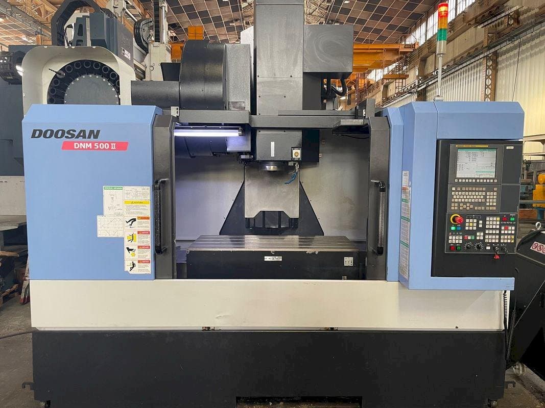 Mašīnas Doosan MYNX DNM 500 II  pretskats