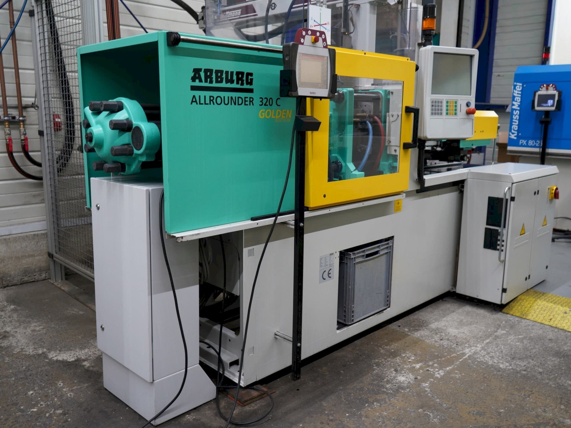 Mašīnas Arburg 320C (500-170) pretskats