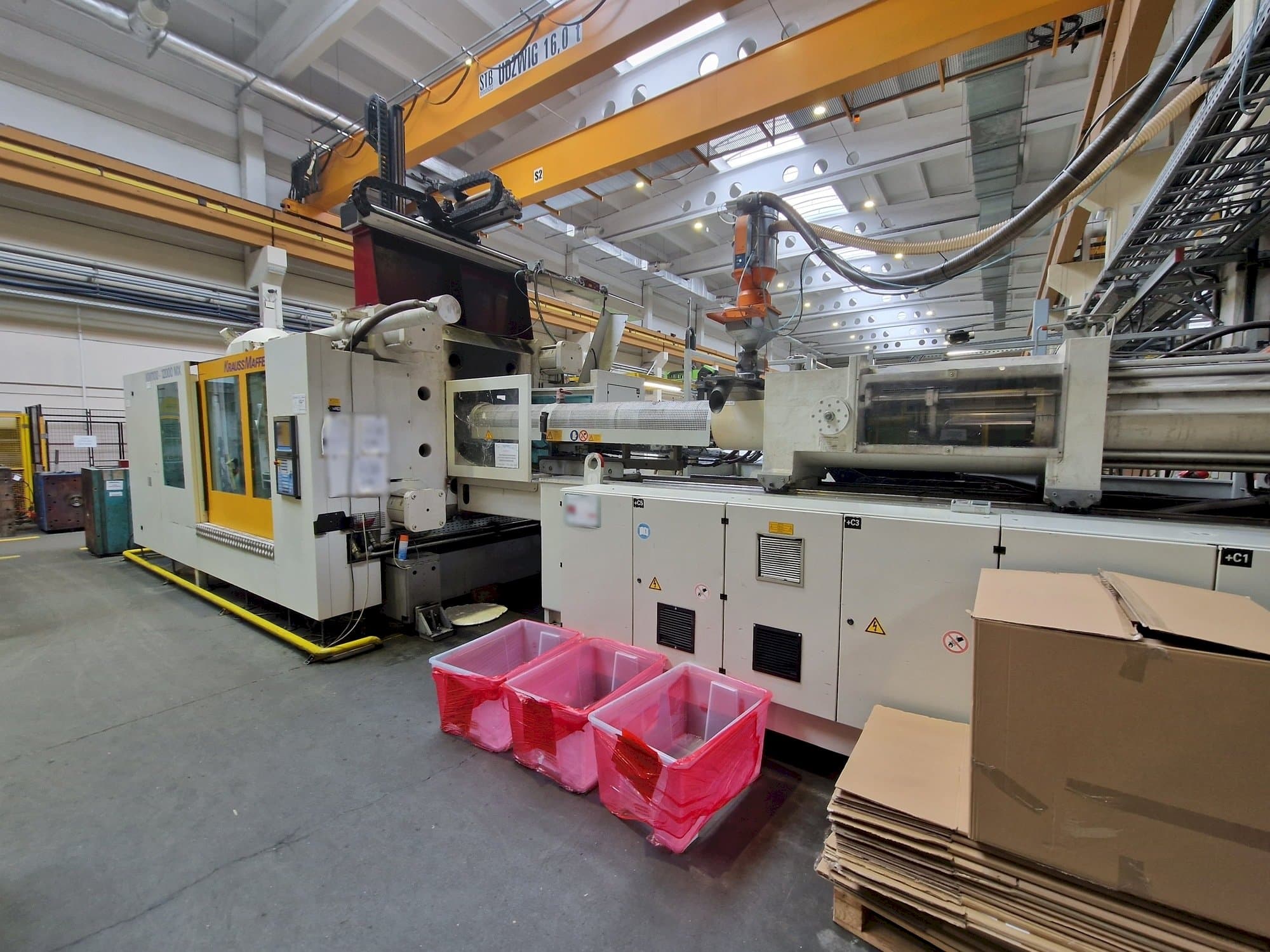 Mašīnas Krauss Maffei 1100-12000 MX  pretskats