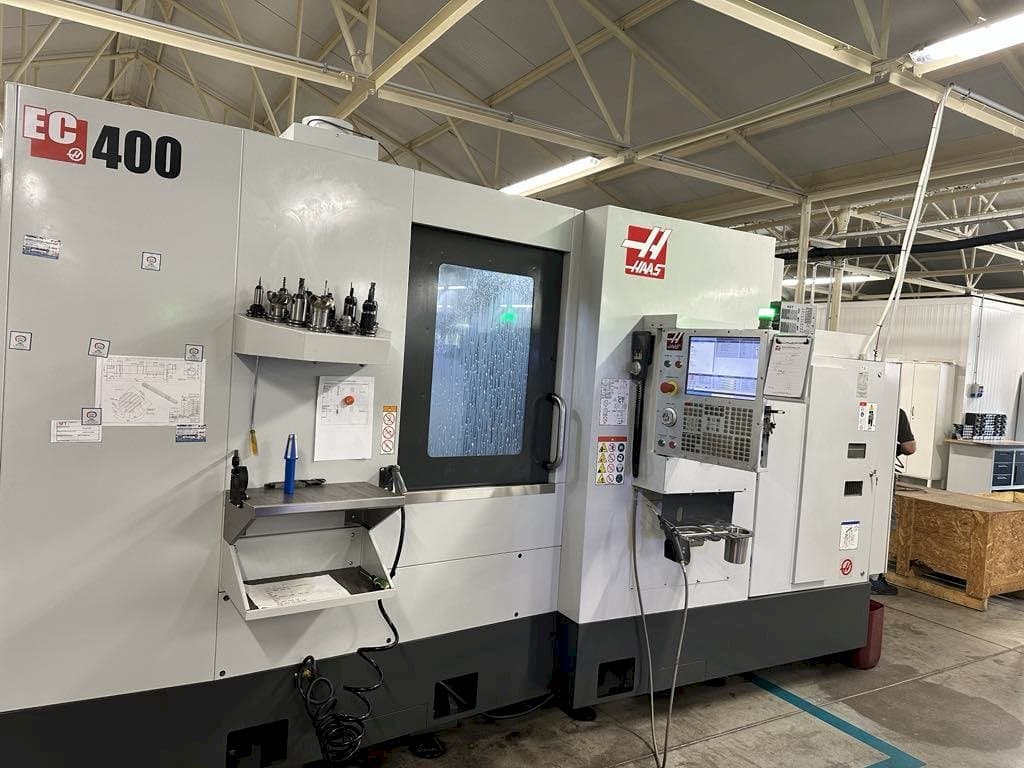 Mašīnas HAAS EC-400 pretskats