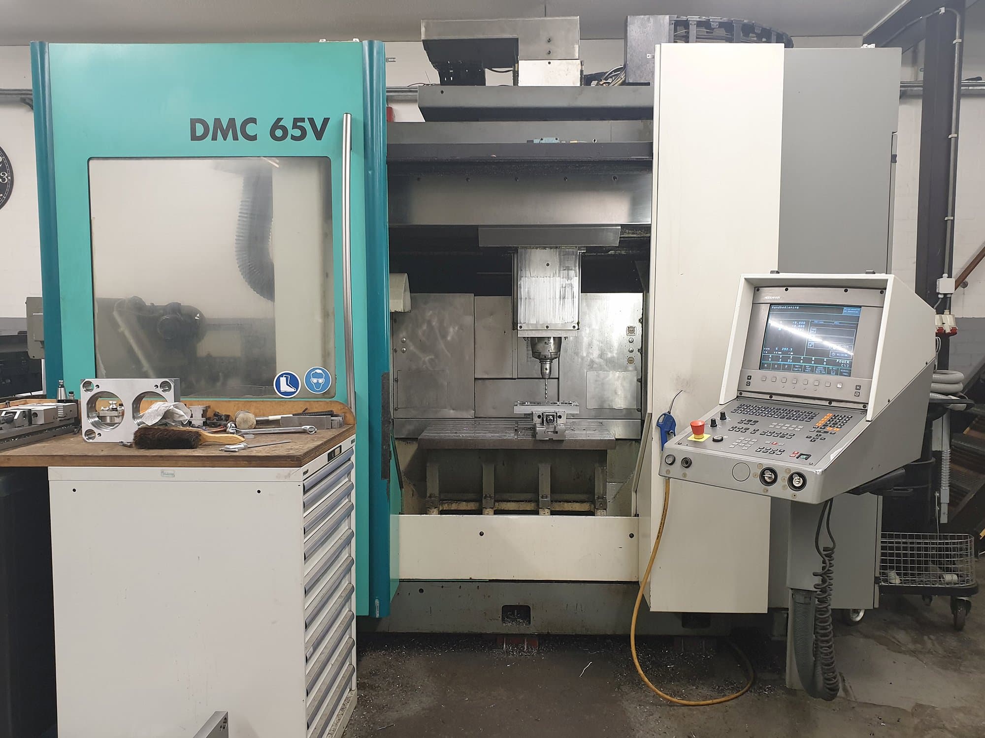 Mašīnas DECKEL MAHO DMC 65V pretskats