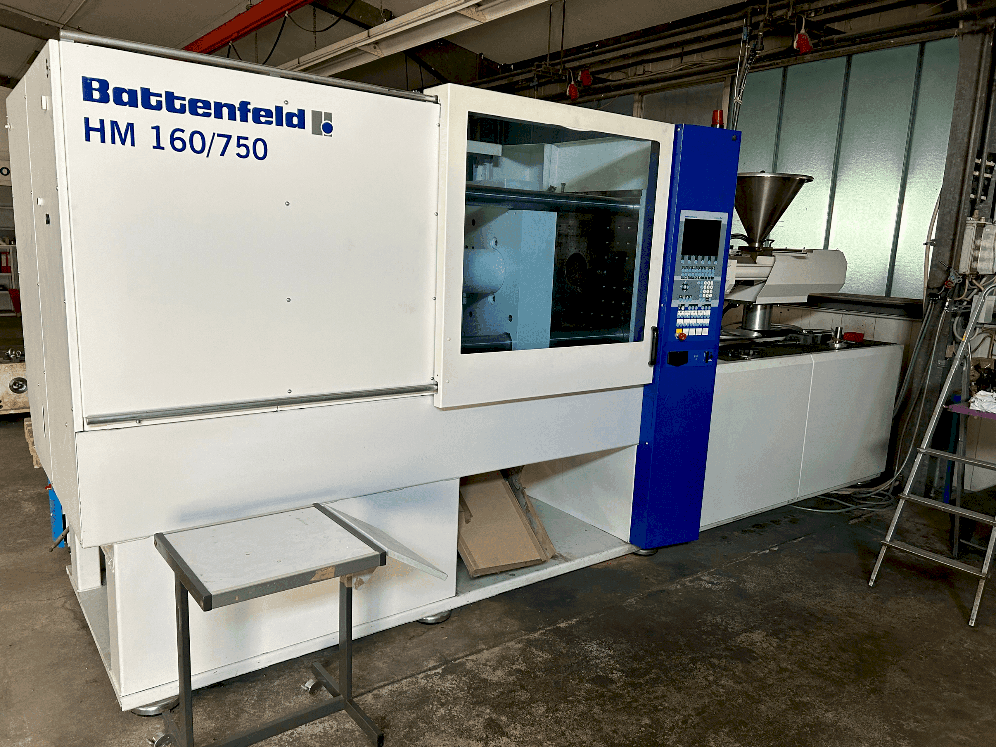 Mašīnas Battenfeld HM160/750E pretskats