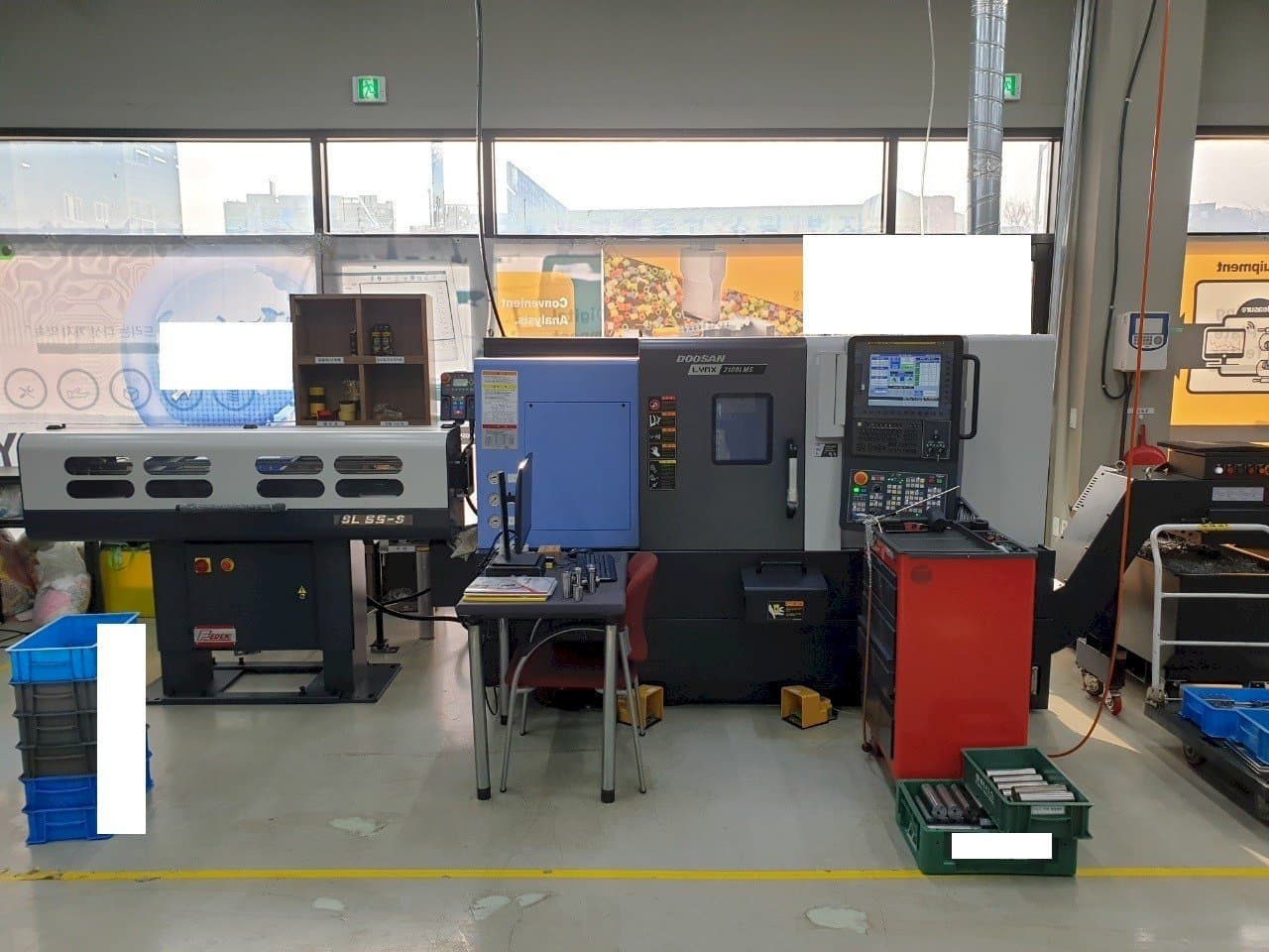 Mašīnas Doosan LYNX2100LMSB pretskats