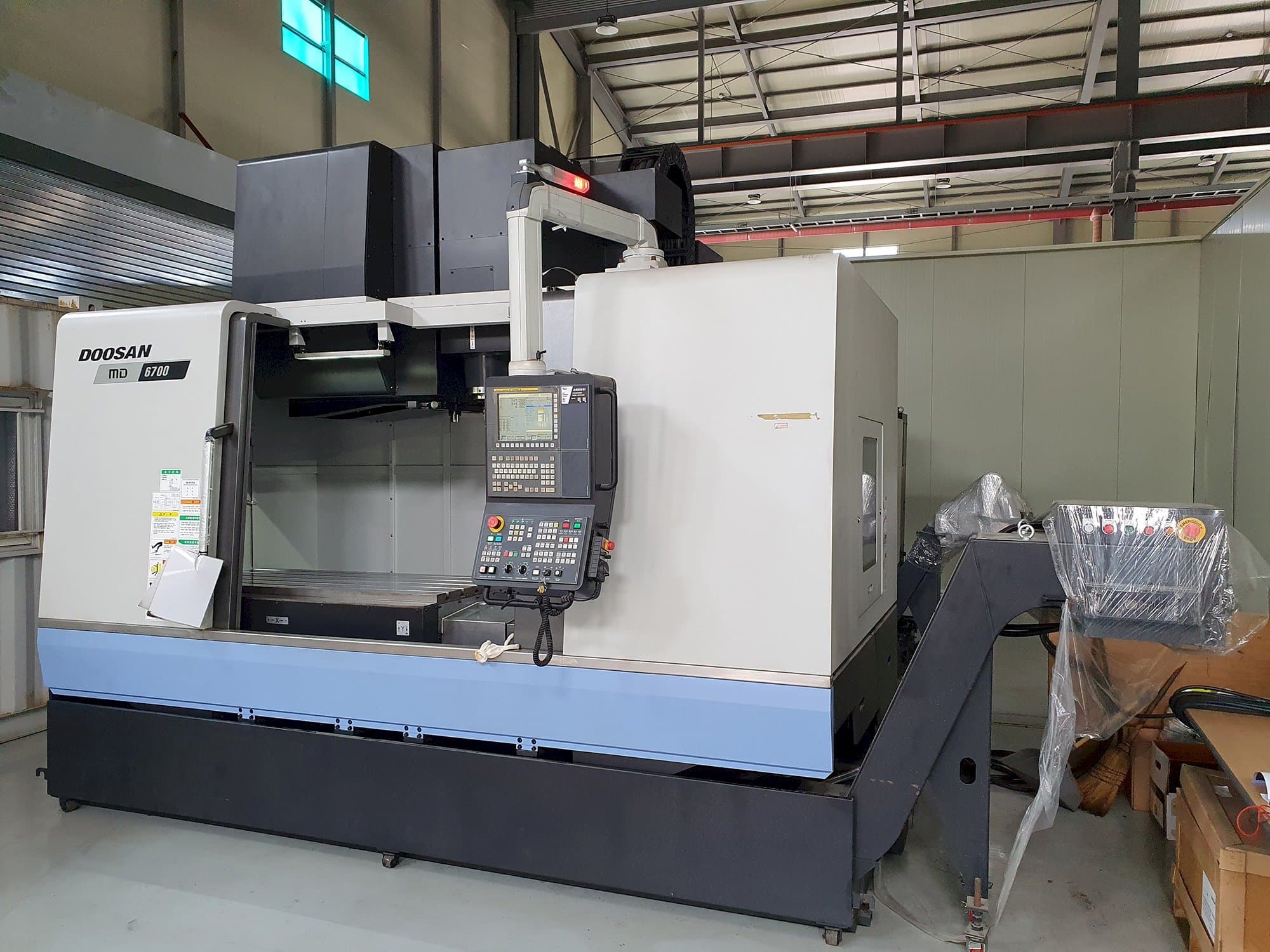 Mašīnas Doosan MD6700 pretskats