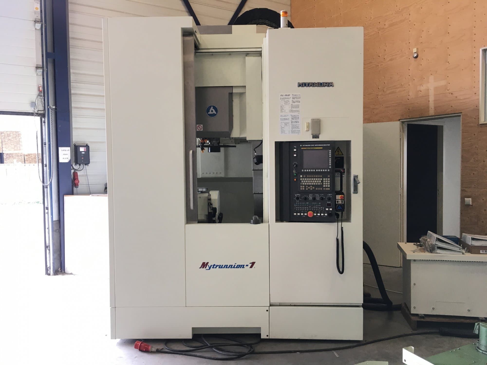 Mašīnas Kitamura Mytrunnion-1 pretskats