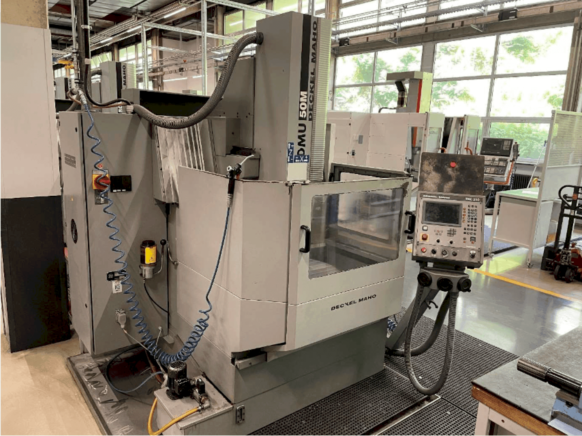 Mašīnas DECKEL DMU 50 pretskats