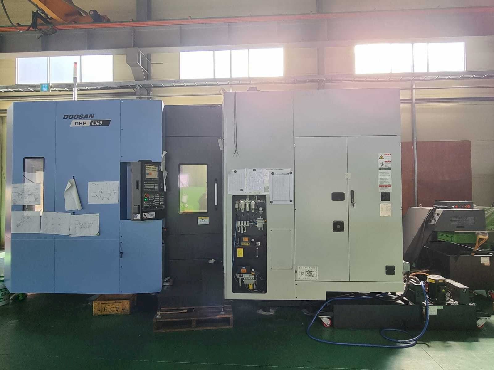 Mašīnas Doosan NHP 6300 pretskats