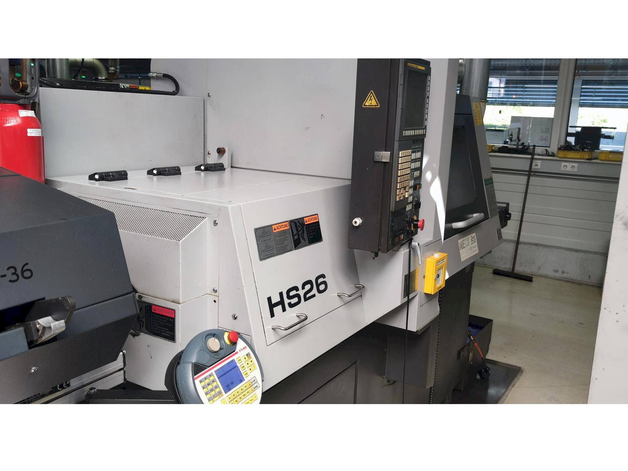 Mašīnas TSUGAMI HS26 kreisās malas skats