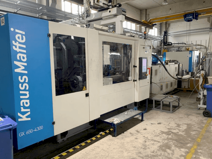 Mašīnas Krauss Maffei KM650-4300 GX pretskats