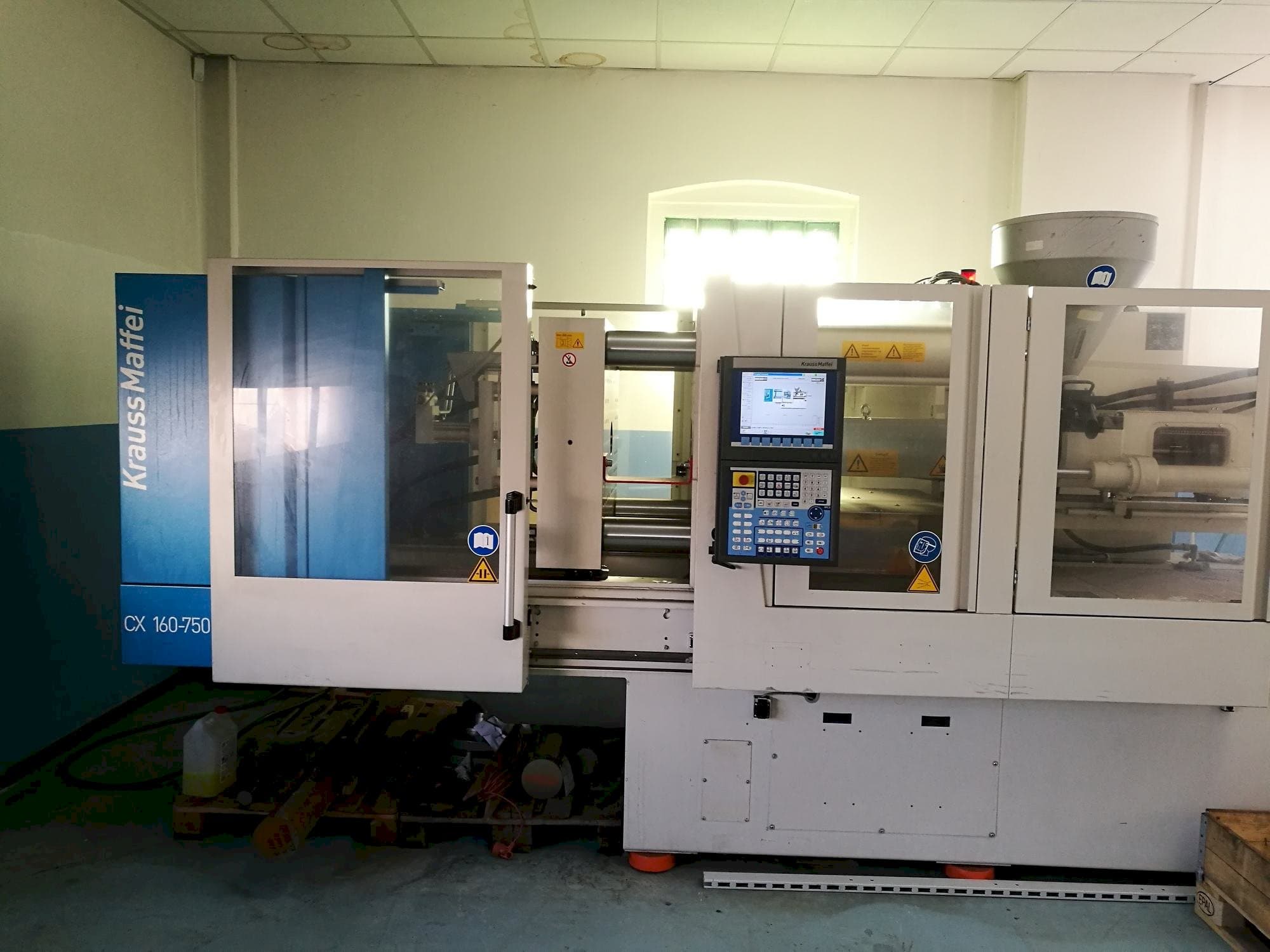 Mašīnas Krauss Maffei KM 160-750 CX pretskats
