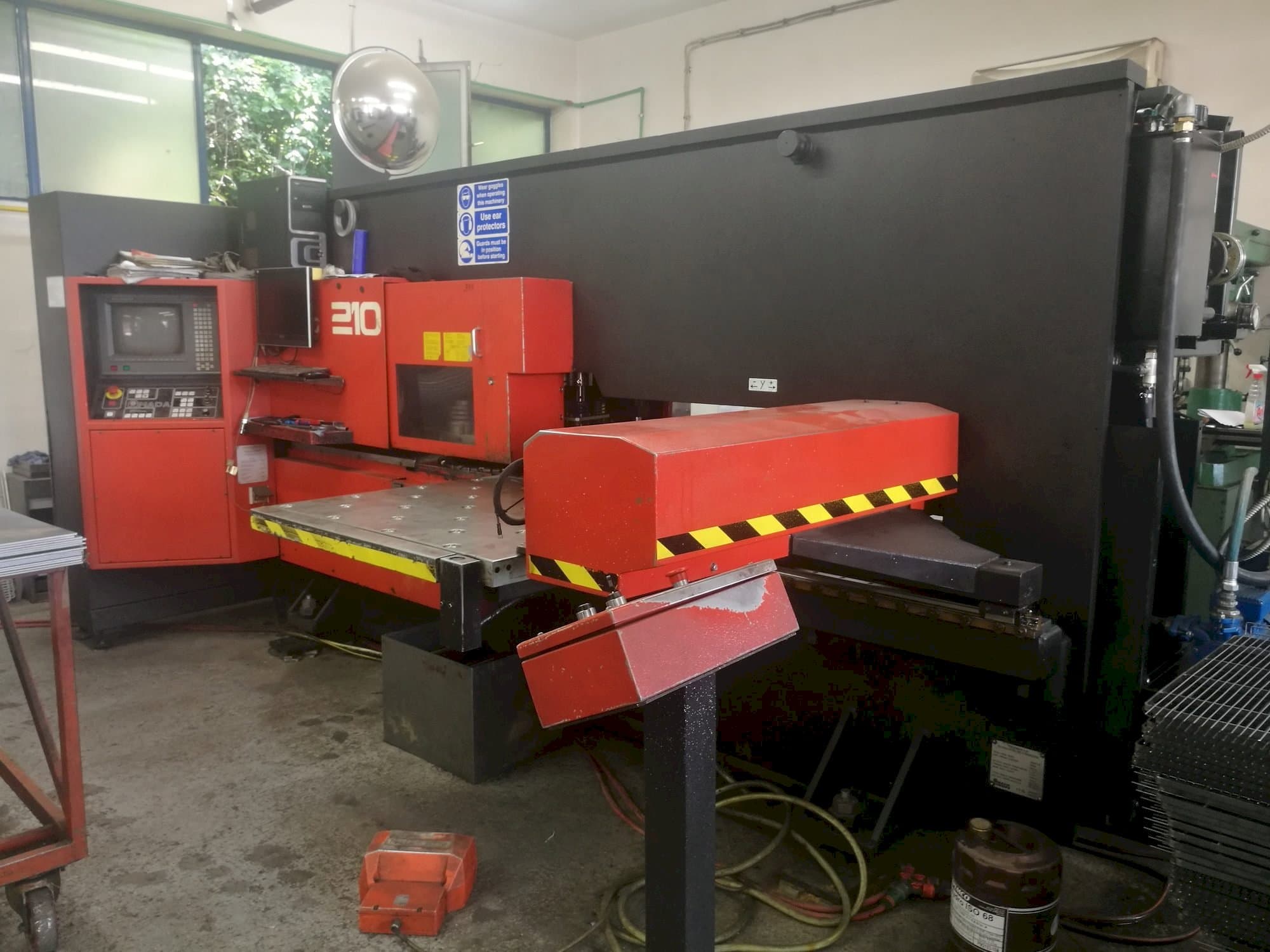 Mašīnas AMADA Arcade 210 pretskats