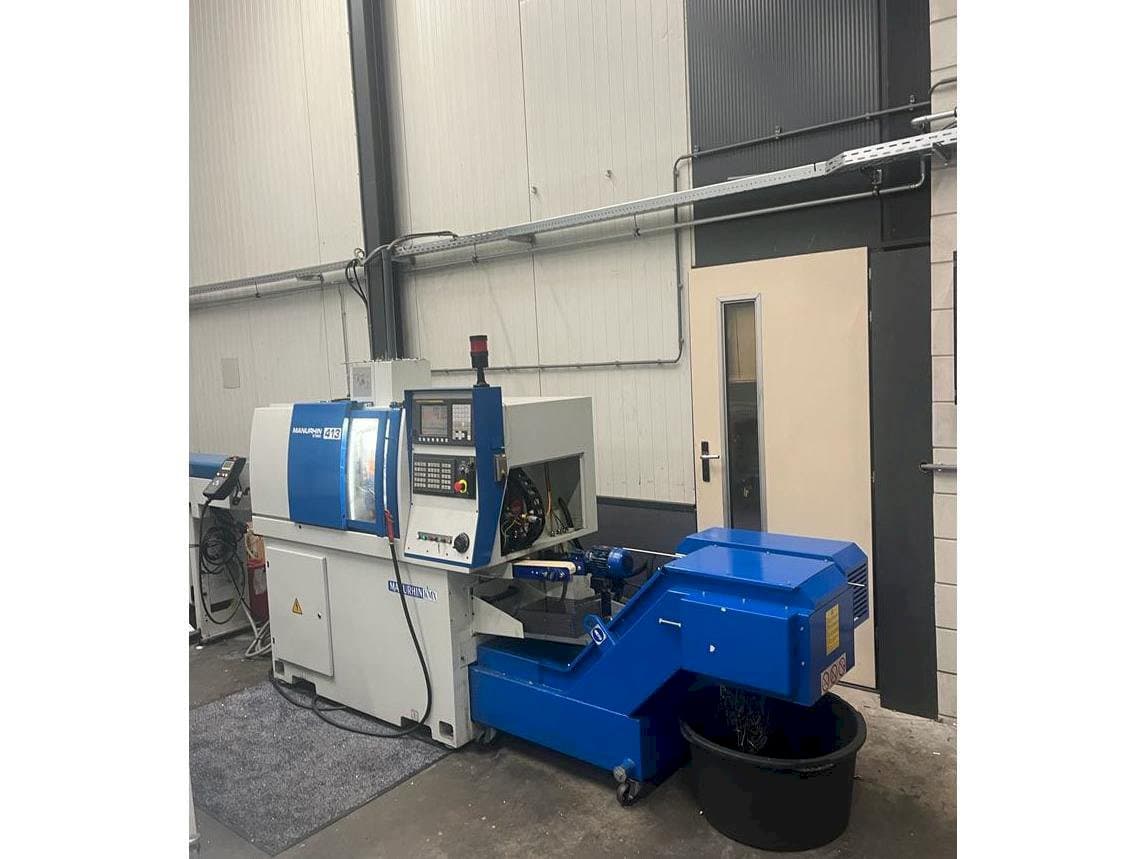 Mašīnas Manurhin K'MX 413  pretskats