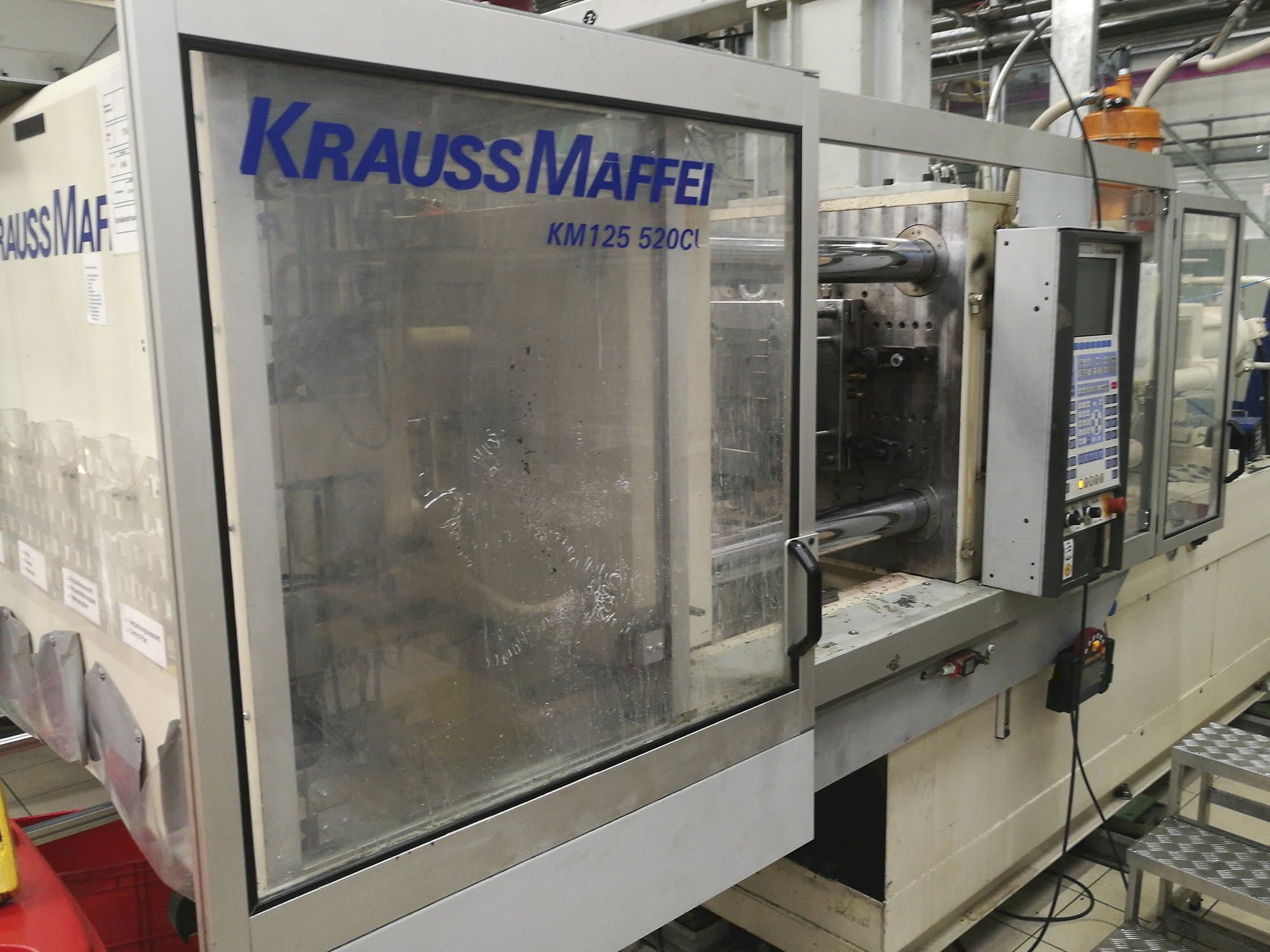 Mašīnas Krauss Maffei KM 125-520 C1 pretskats