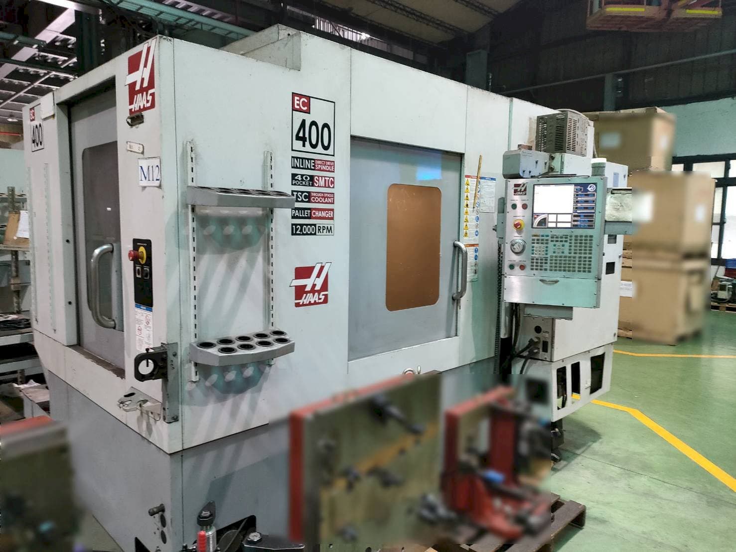 Mašīnas HAAS EC-400 pretskats