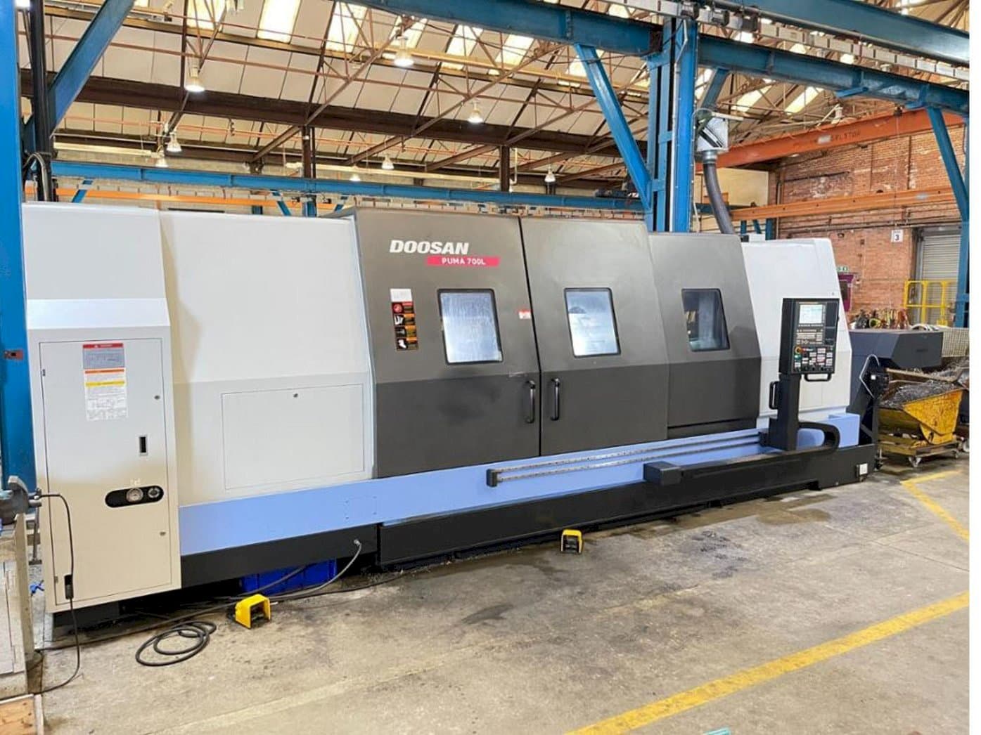 Mašīnas Doosan Puma 700L pretskats