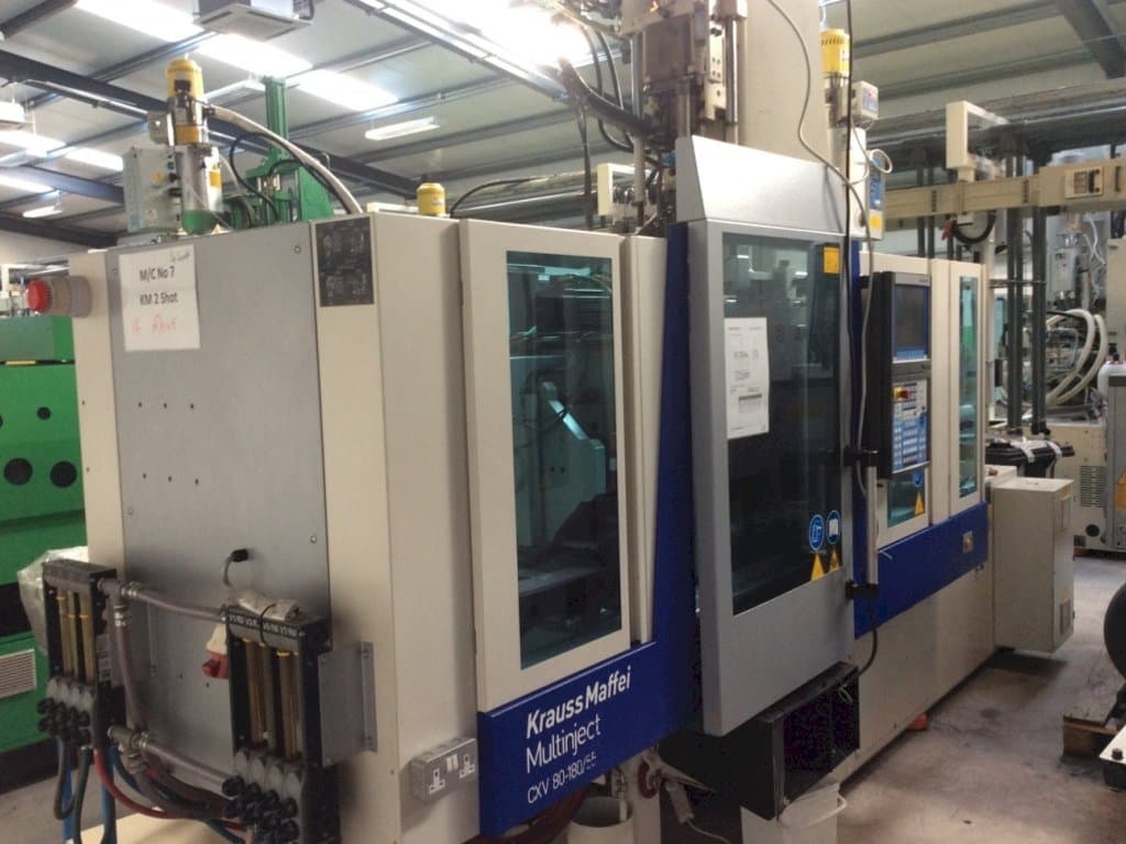 Mašīnas Krauss Maffei Multinject 80-180-55 CX V pretskats