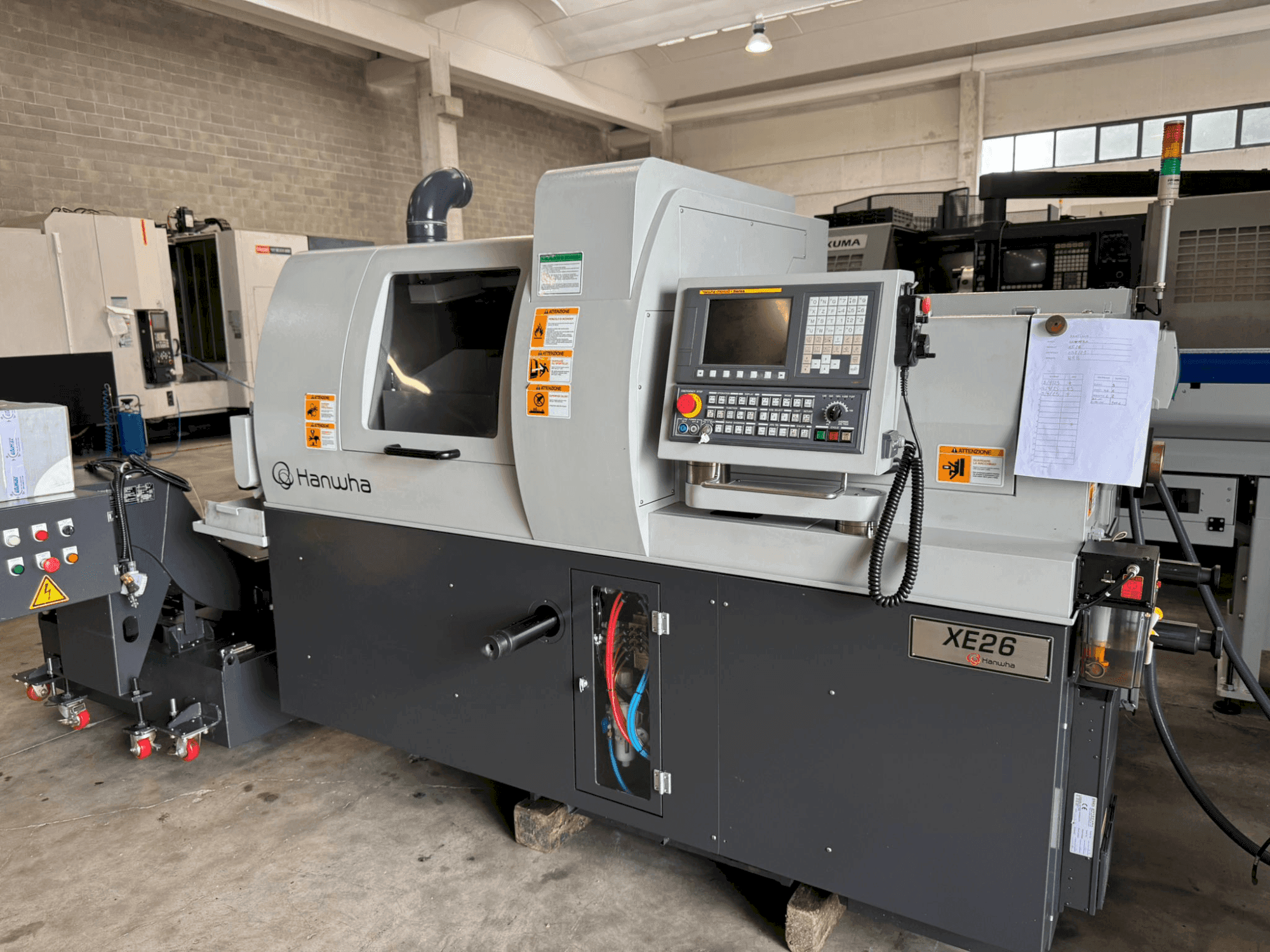Mašīnas Hanwha XE 26 H pretskats