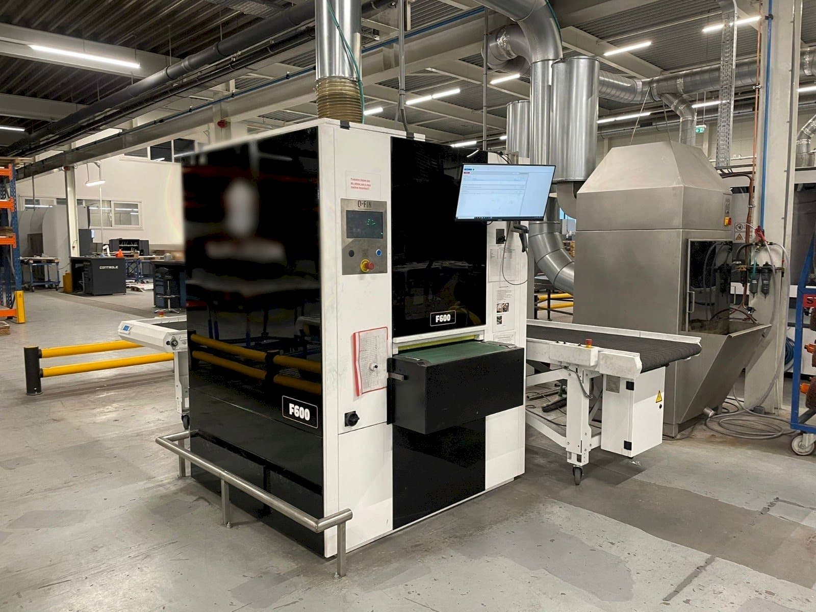 Mašīnas Q-FIN F600  pretskats