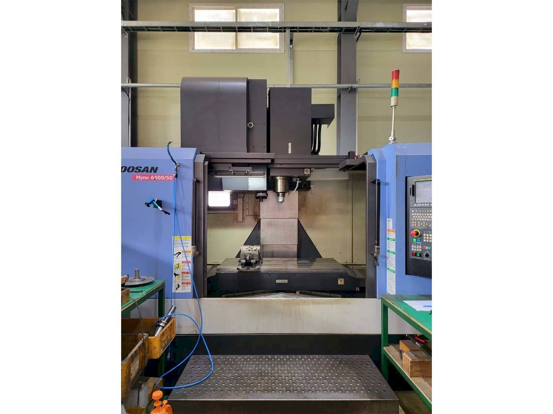 Mašīnas Doosan MYNX 6500/50 pretskats