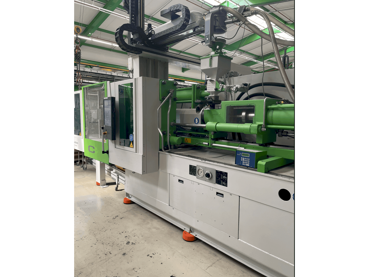 Mašīnas Krauss Maffei KM 200-1400CM pretskats