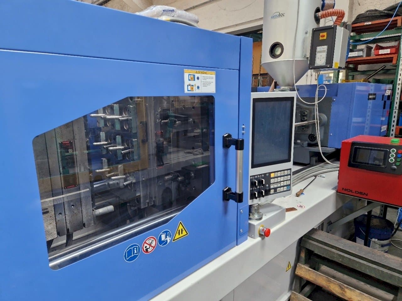 Mašīnas JSW J180ADS-300U kreisās malas  skats