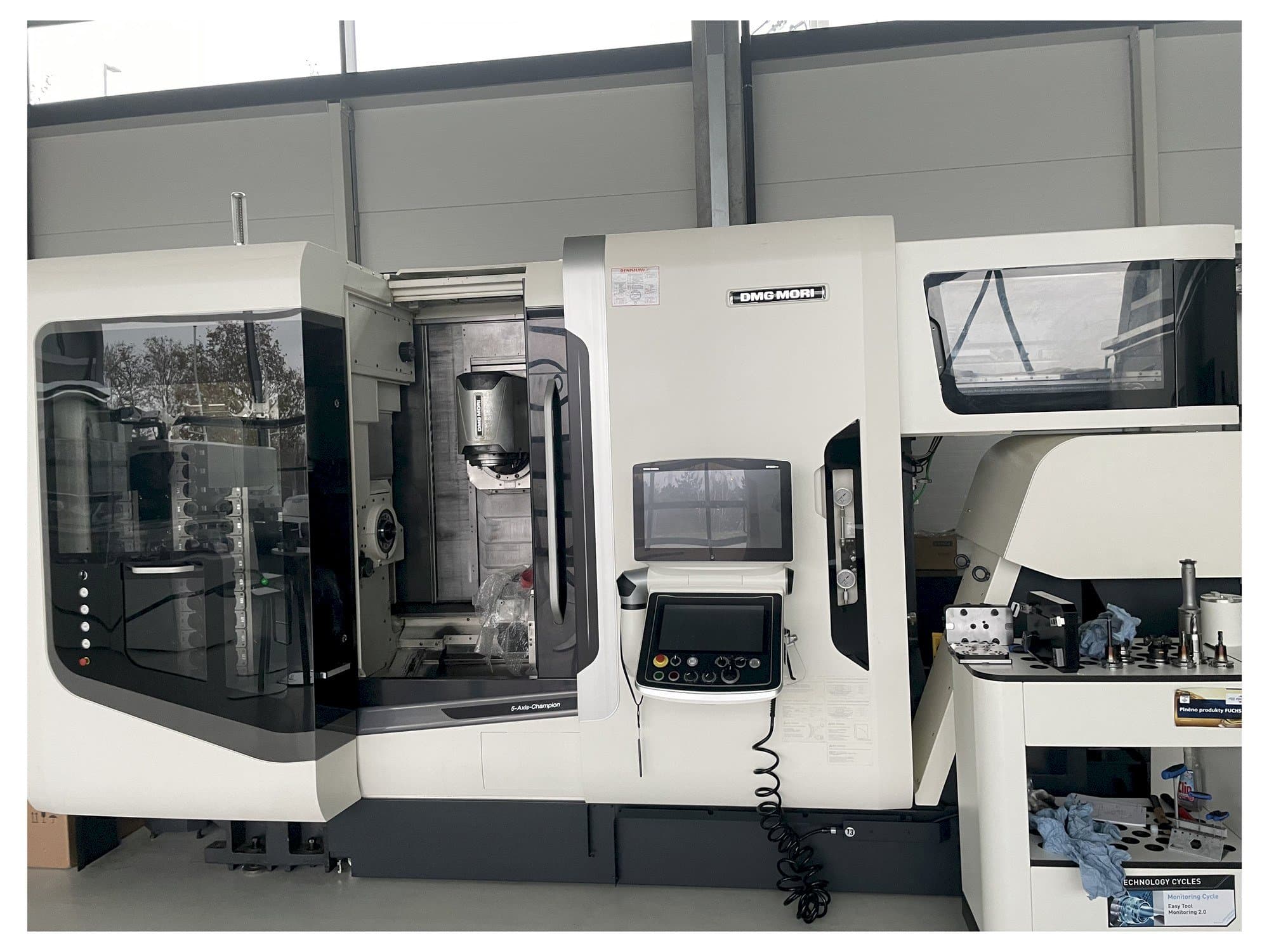 Mašīnas DMG MORI NTX 1000 pretskats