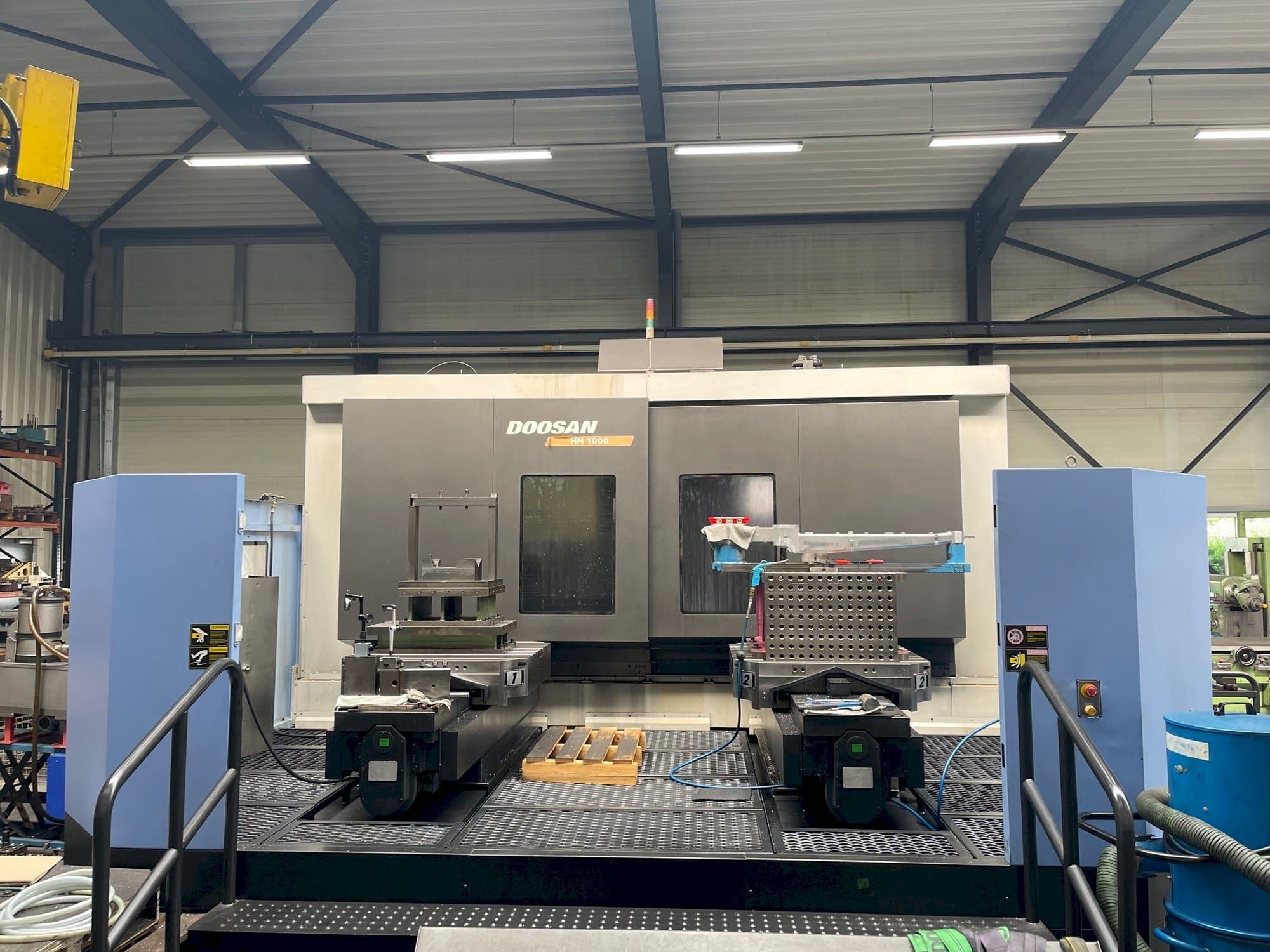 Mašīnas Doosan HM 1000  pretskats