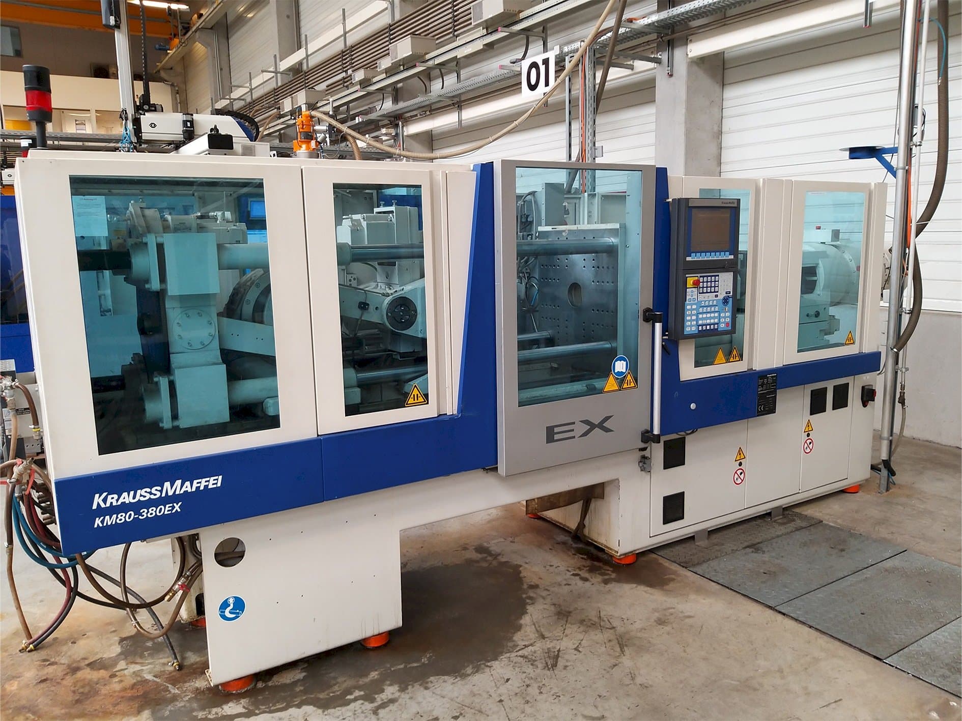 Mašīnas Krauss Maffei 80-380 Ex pretskats