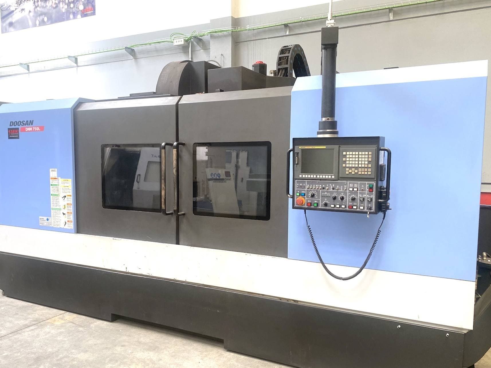 Mašīnas Doosan DNM 750L pretskats