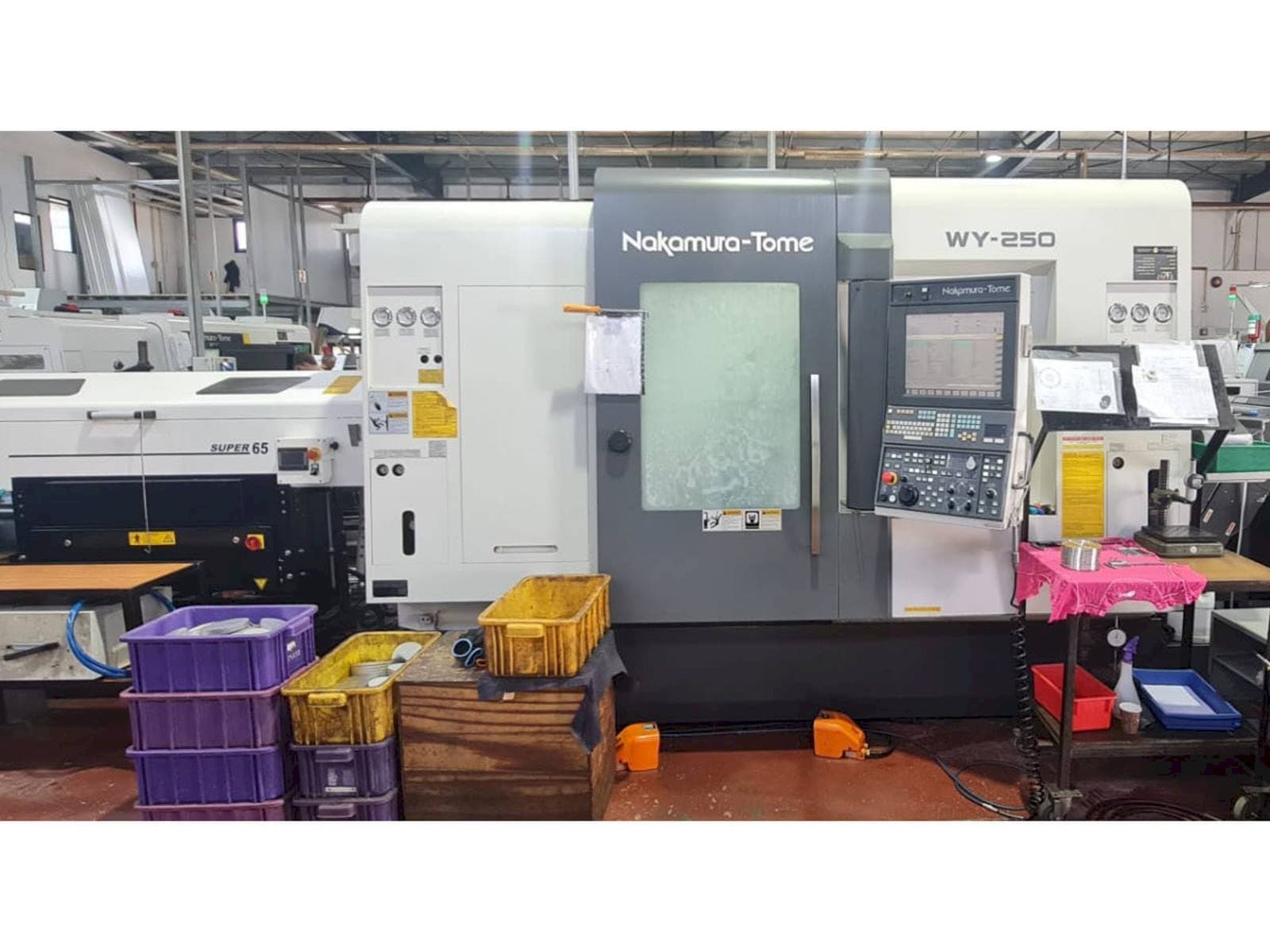 Mašīnas NAKAMURA-TOME WY 250 pretskats