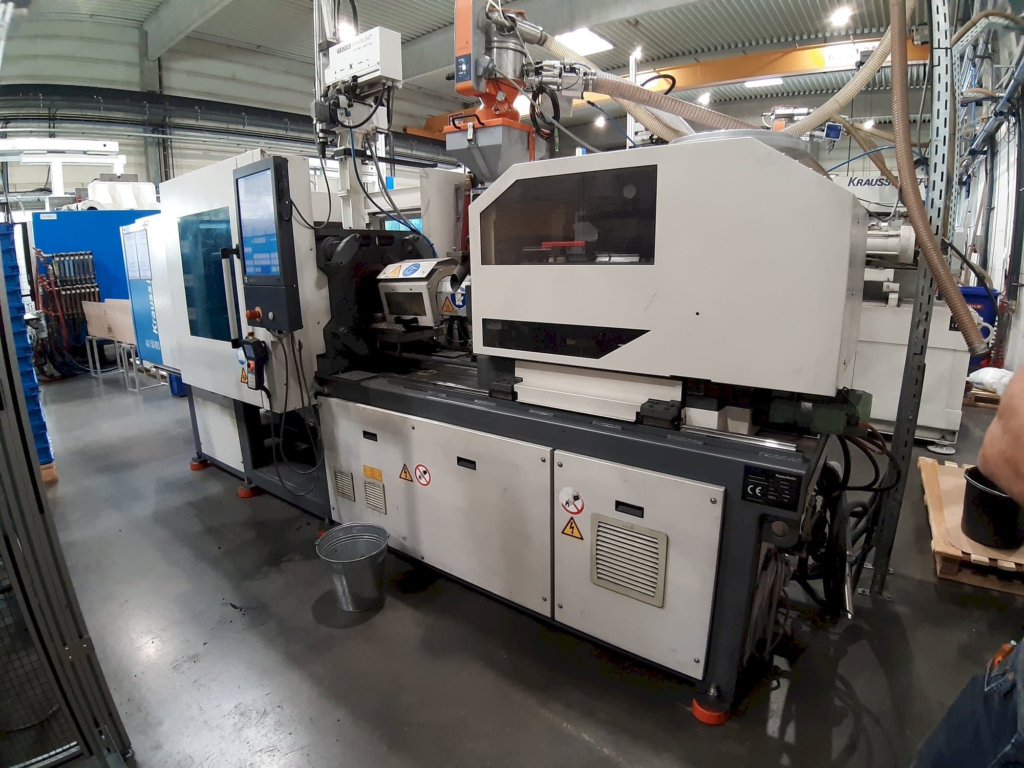 Mašīnas Krauss Maffei 50 - 100 AX pretskats