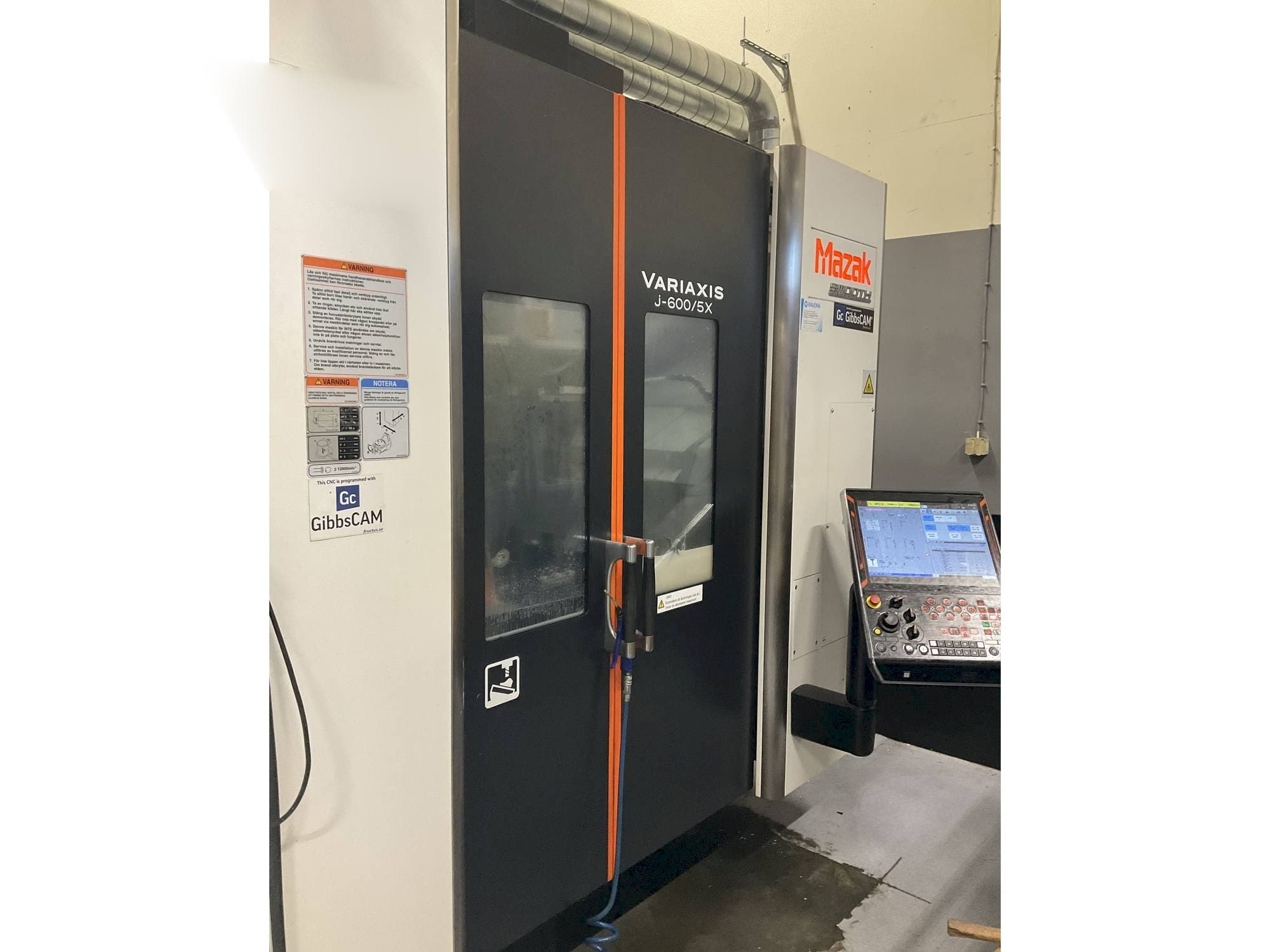 Mašīnas Mazak Variaxis J-600  pretskats