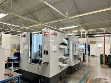Mašīnas HAAS EC-400 pretskats