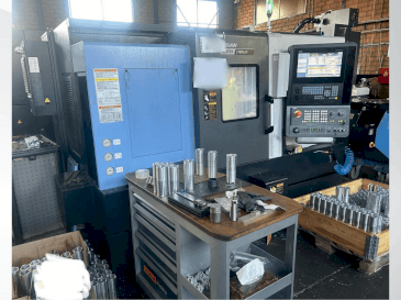 Mašīnas DOOSAN LYNX 2100LSYA pretskats