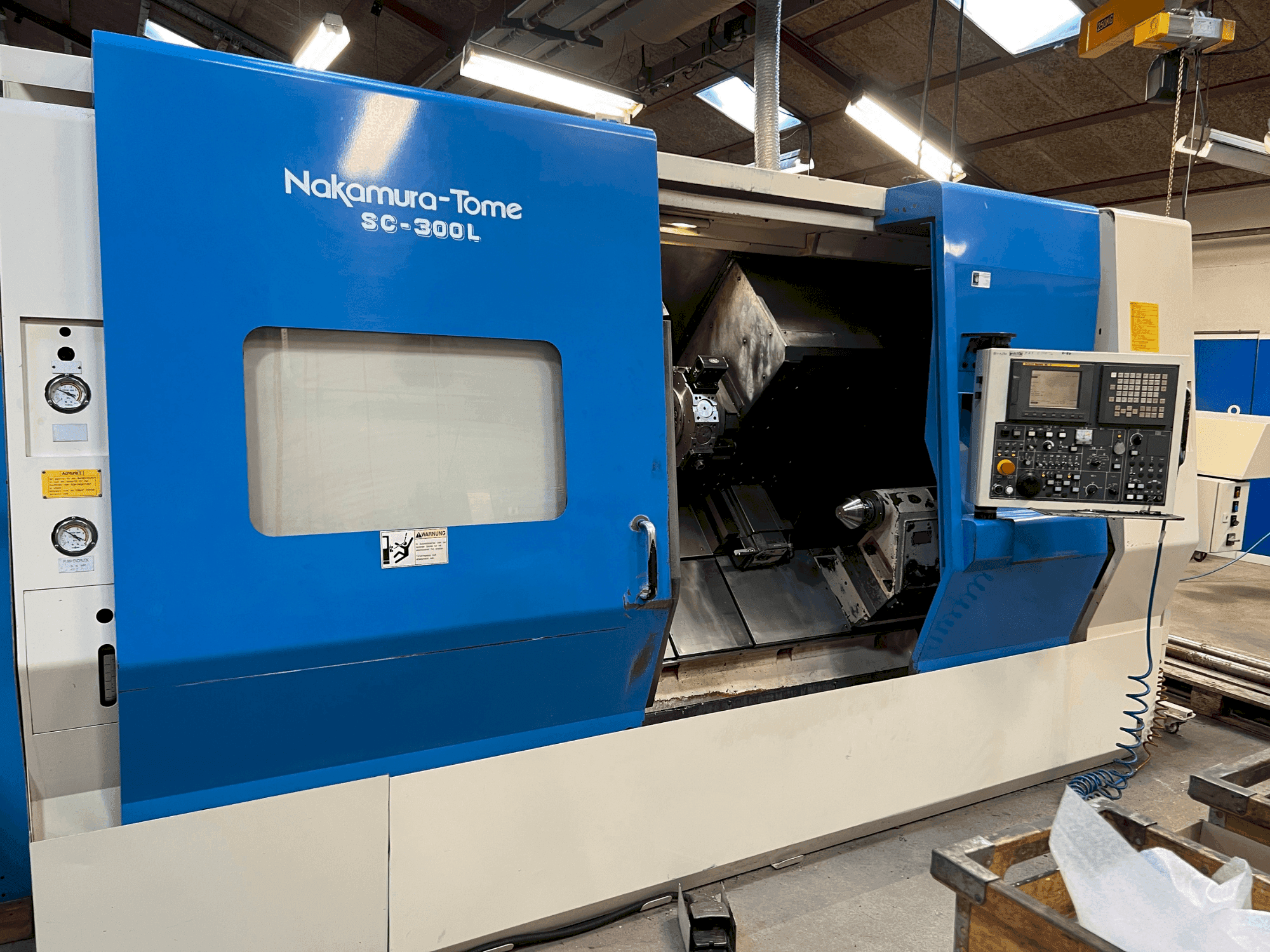 Mašīnas NAKAMURA SL 300LY pretskats