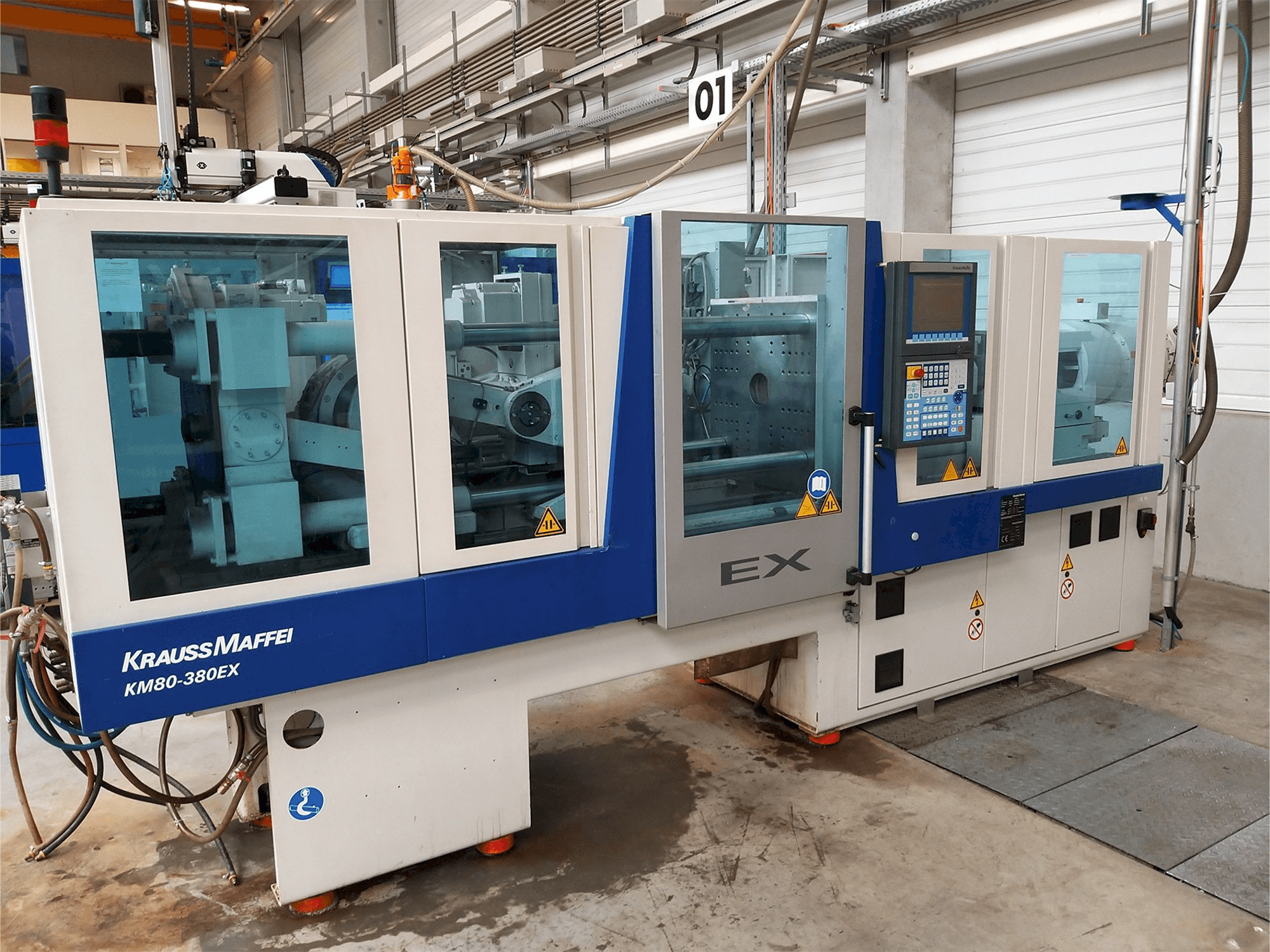 Mašīnas Krauss Maffei 80-380 Ex pretskats