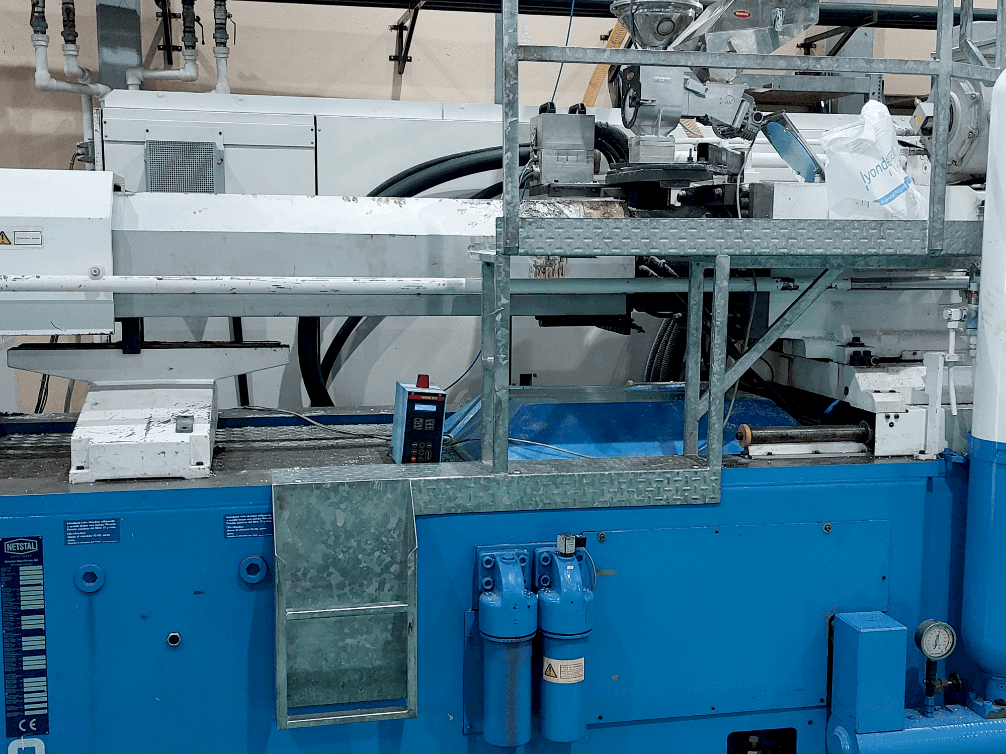 Mašīnas Netstal S 6000-5500E pretskats