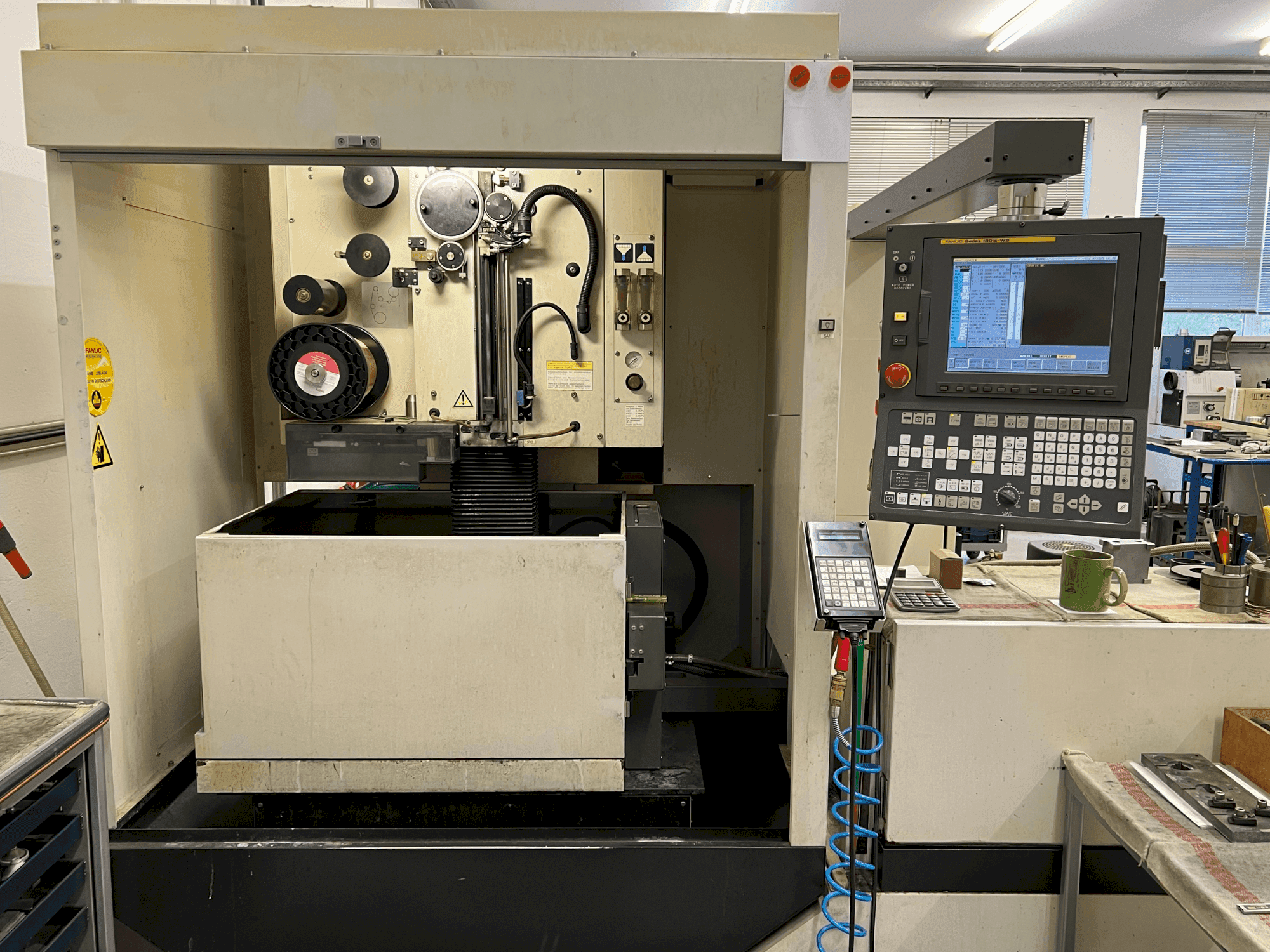 Mašīnas FANUC Alpha-0iC pretskats