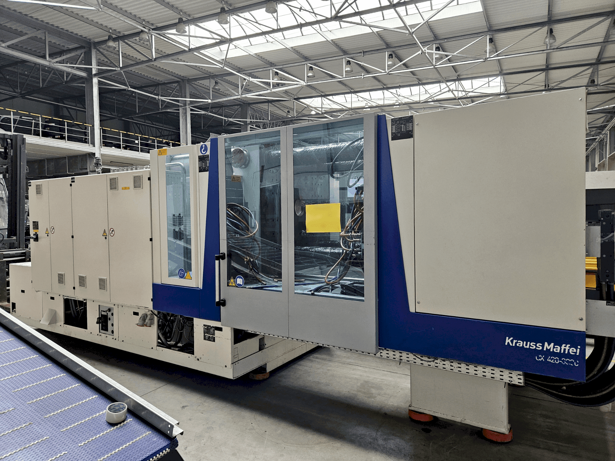 Mašīnas Krauss Maffei 420-3000 CX pretskats