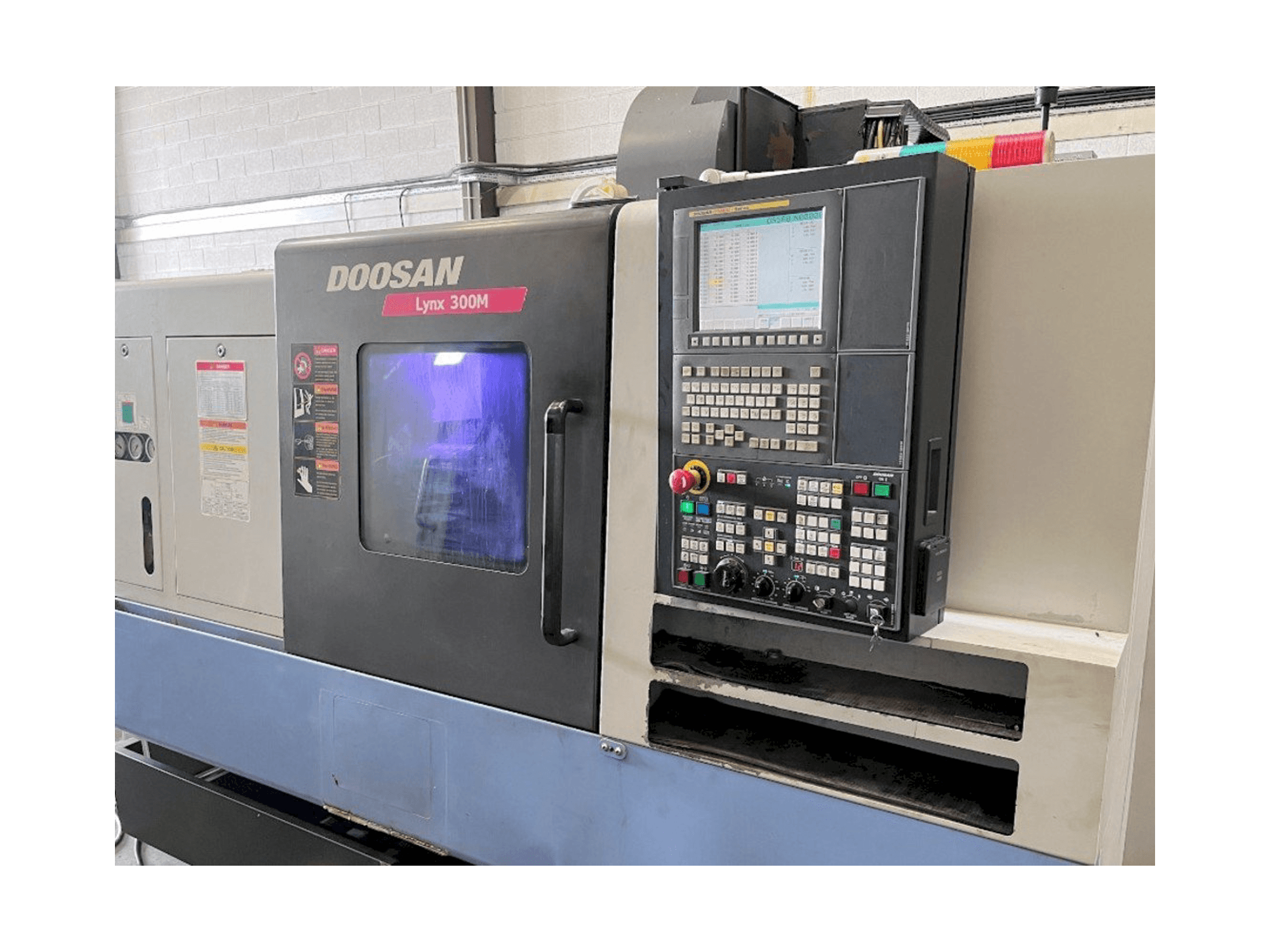 Mašīnas Doosan Lynx 300M pretskats