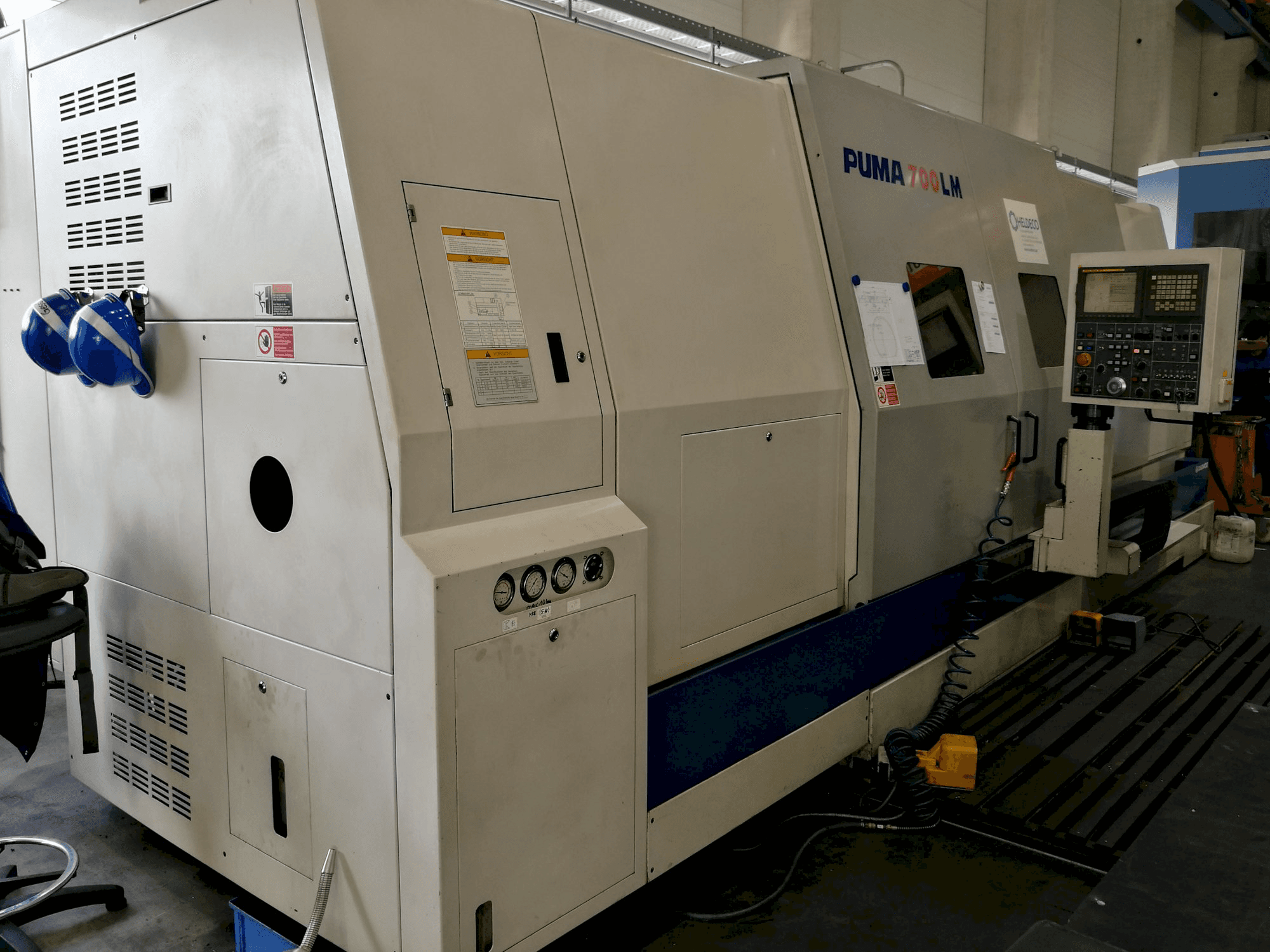 Mašīnas Doosan Puma 700 LM skats no kreisās puses