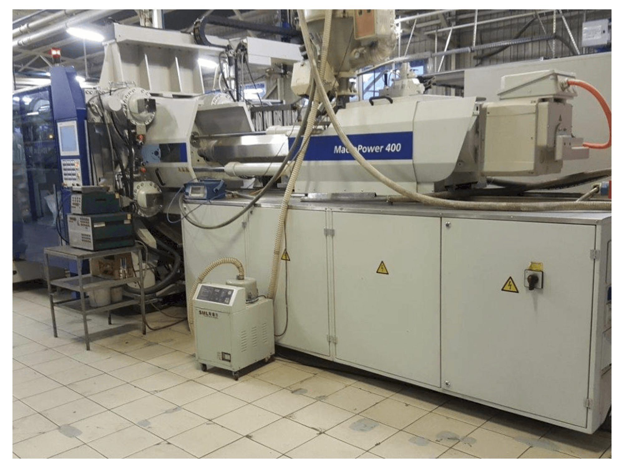 Mašīnas Battenfeld Macro Power 400/3400 pretskats