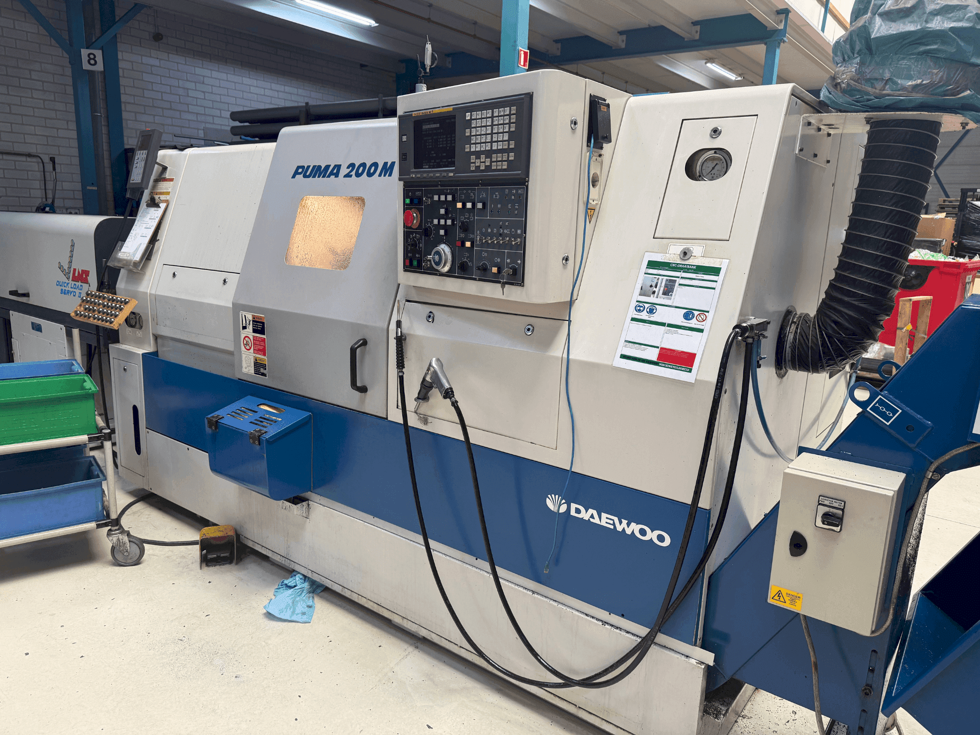 Mašīnas DAEWOO Puma 200 LMC pretskats